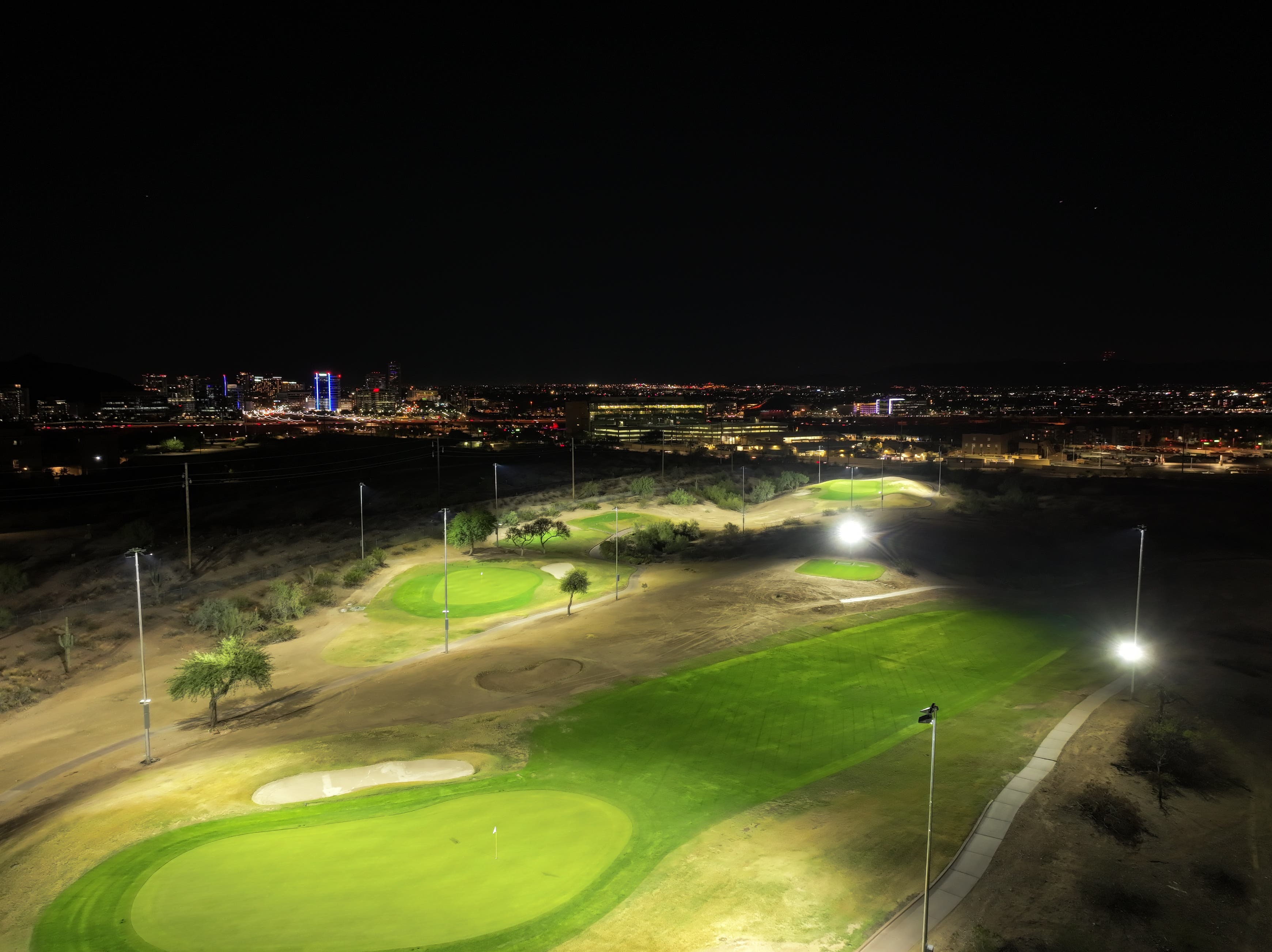 Landscape putting greens and fairway photo of the Grass Clippings Rolling Hills golf course
