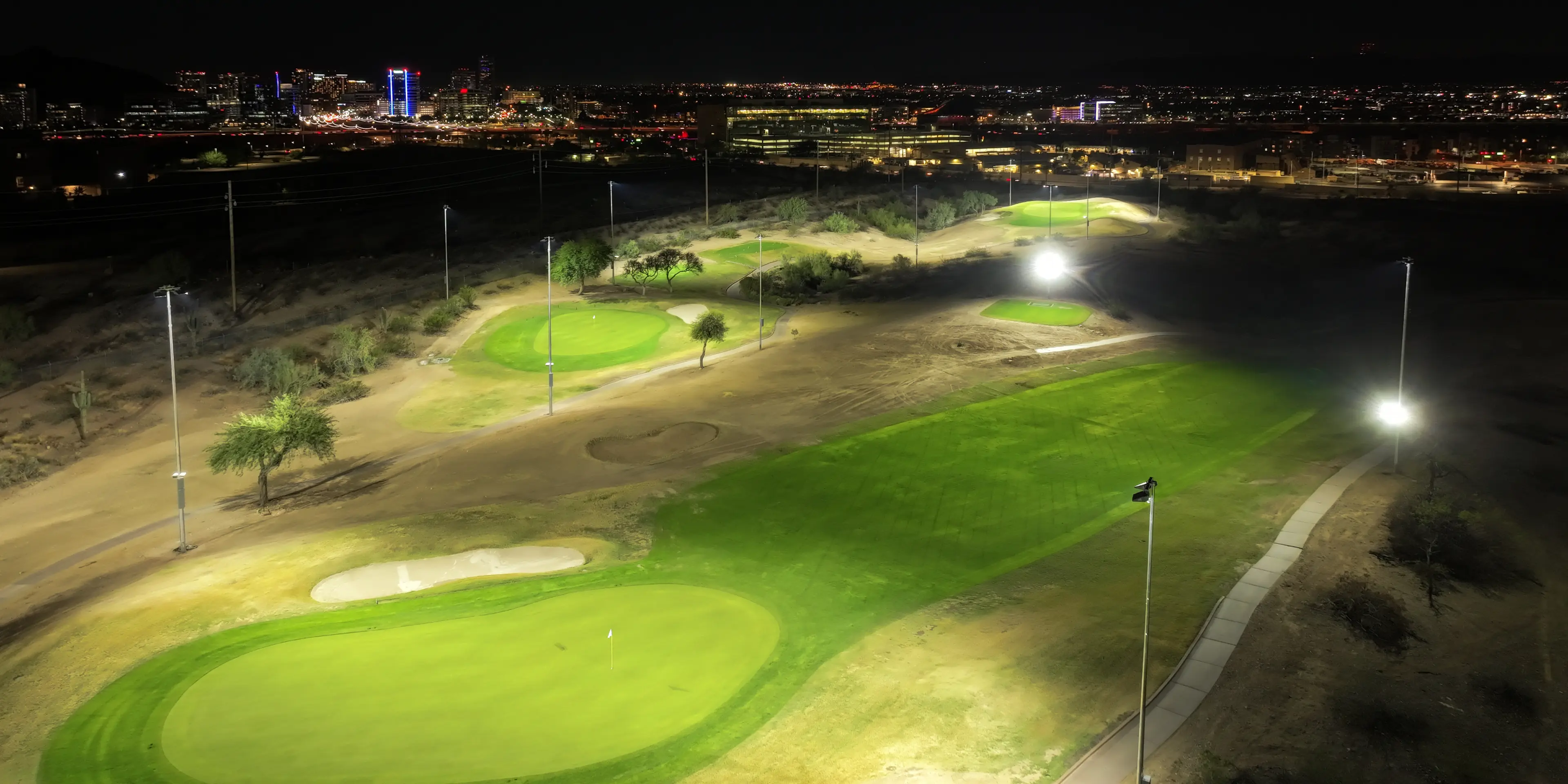 Landscape putting greens and fairway photo of the Grass Clippings Rolling Hills golf course