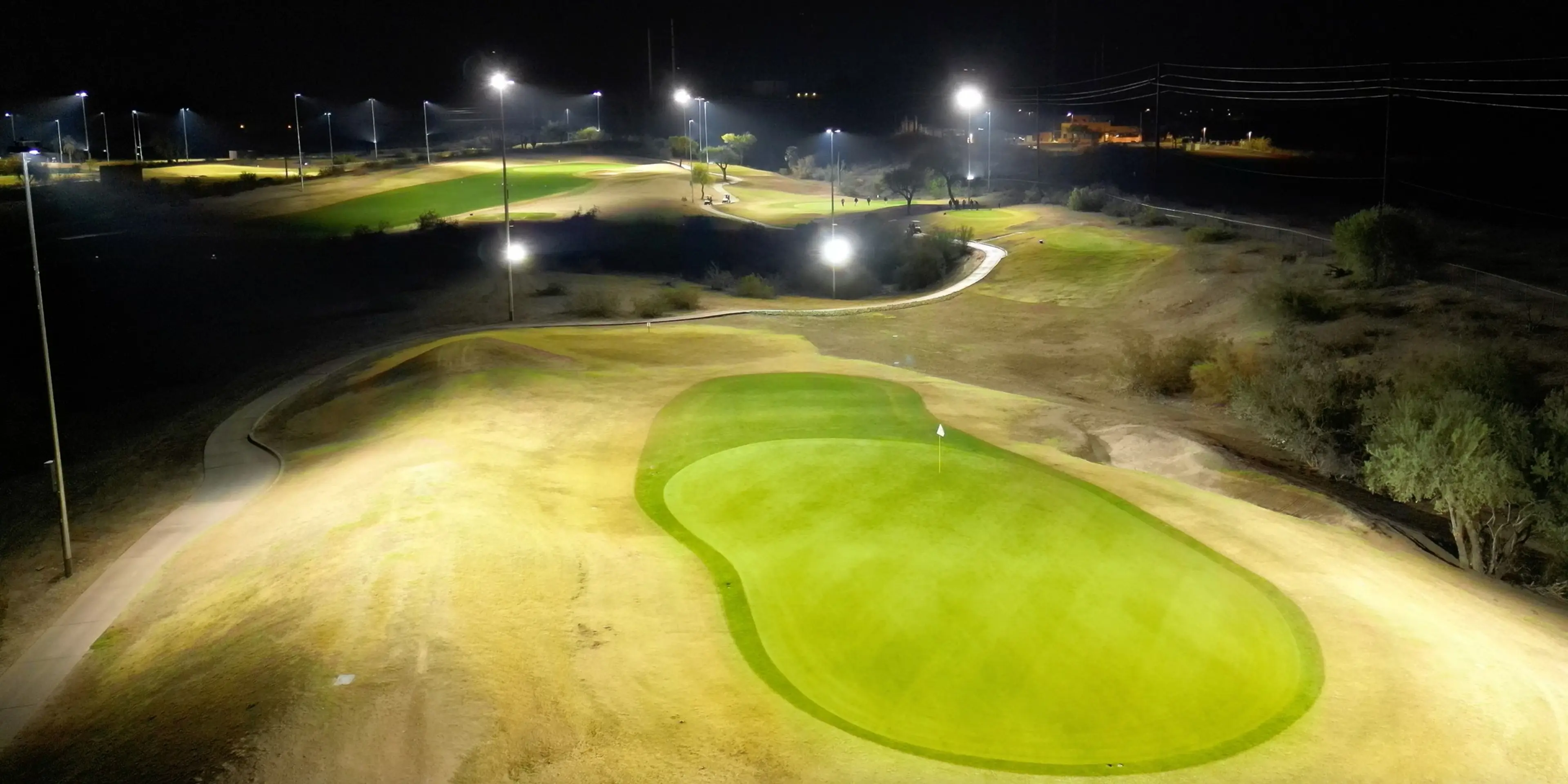 Landscape putting greens and fairway photo of the Grass Clippings Rolling Hills golf course