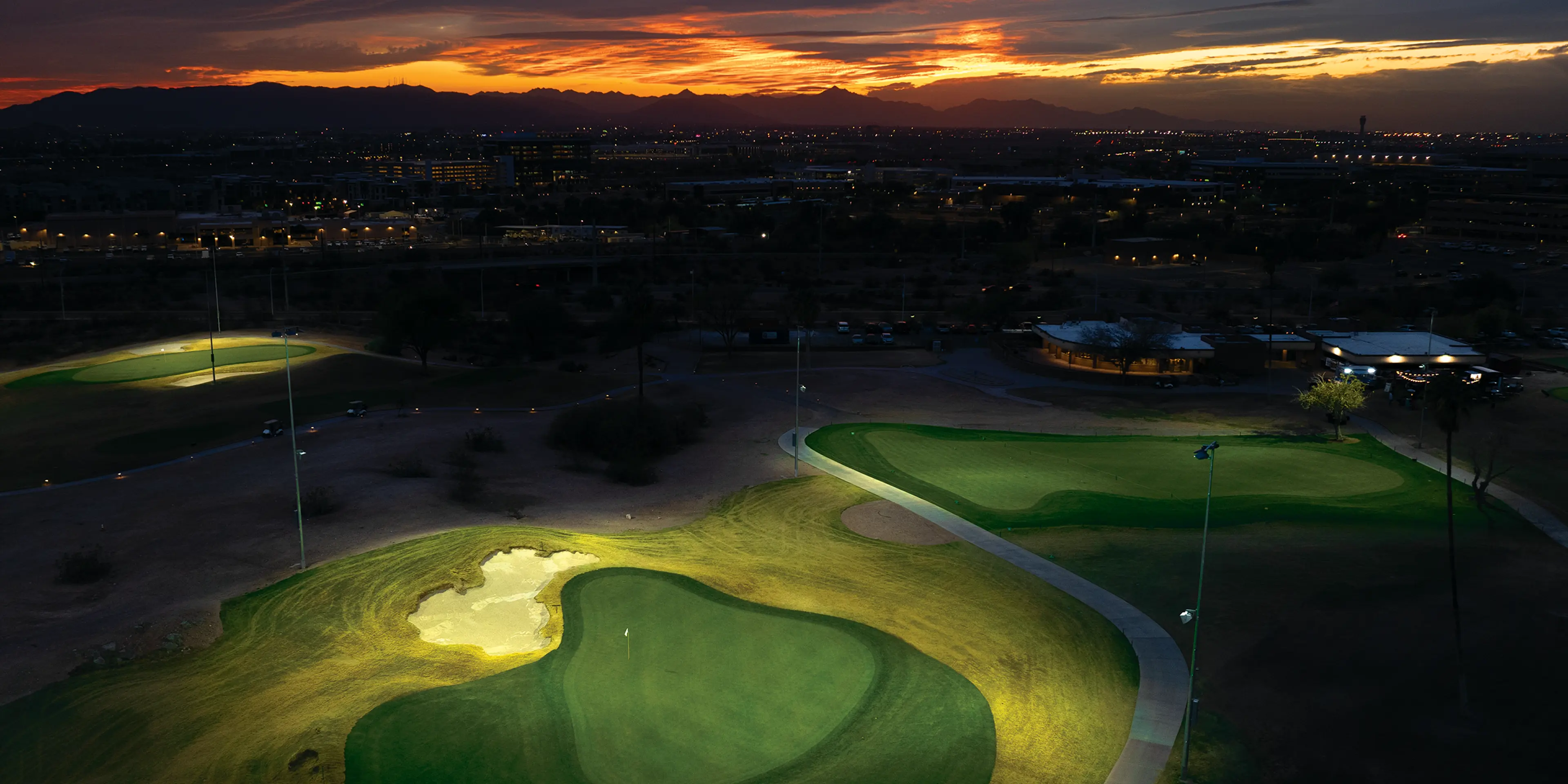 Landscape putting greens and fairway photo of the Grass Clippings Rolling Hills golf course