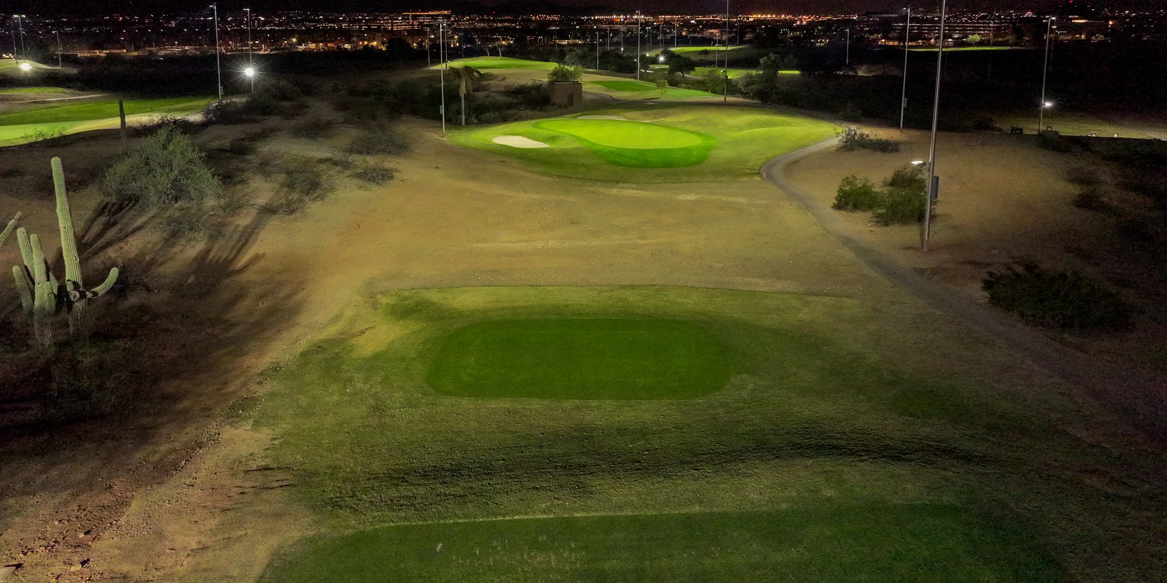 Landscape putting greens and fairway photo of the Grass Clippings Rolling Hills golf course