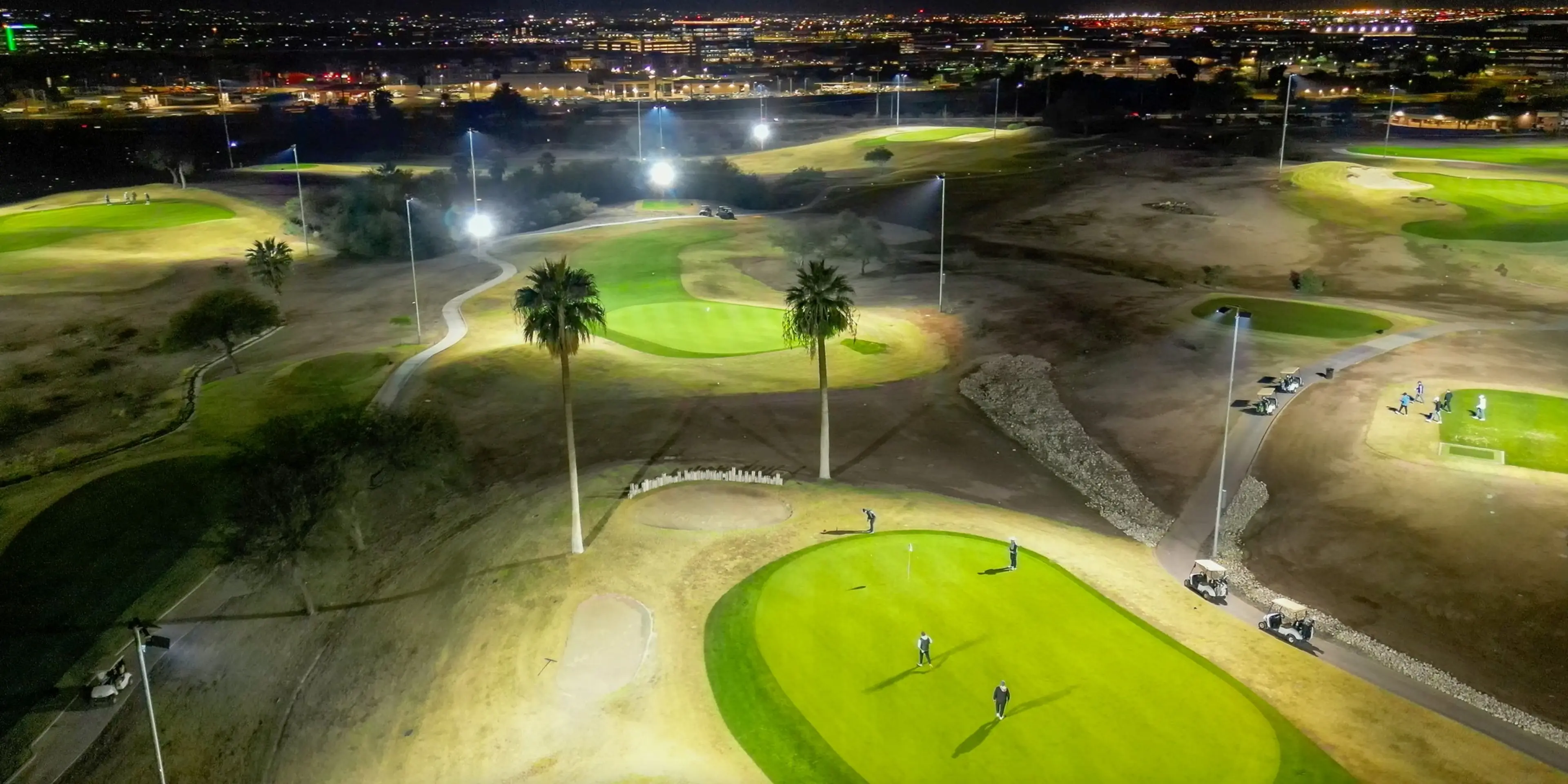 Landscape putting greens and fairway photo of the Grass Clippings Rolling Hills golf course