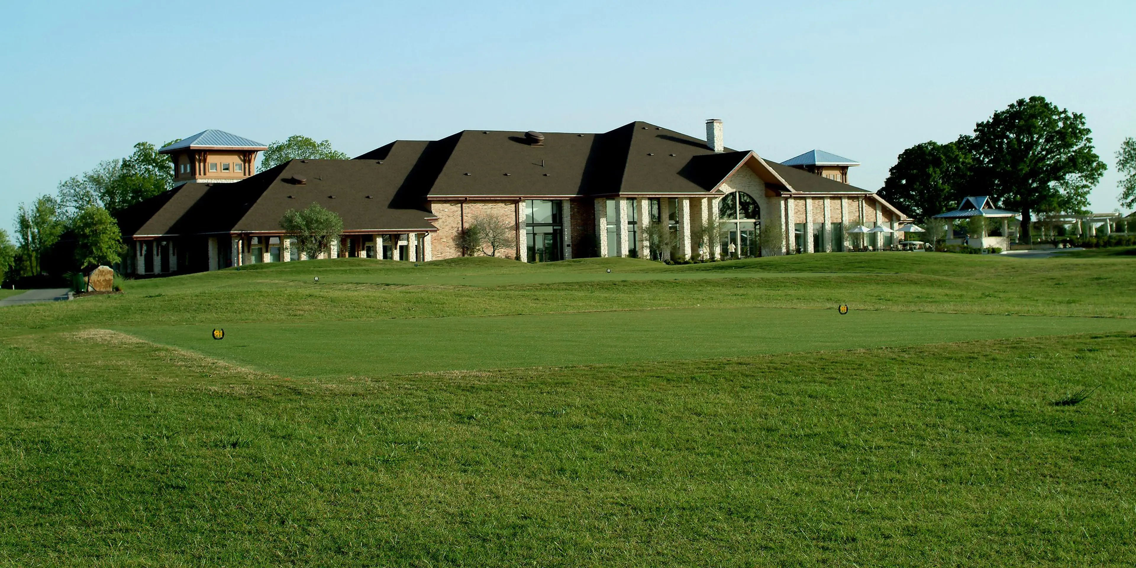 Landscape putting greens and fairway photo of the Heritage Ranch Golf & Country Club golf course