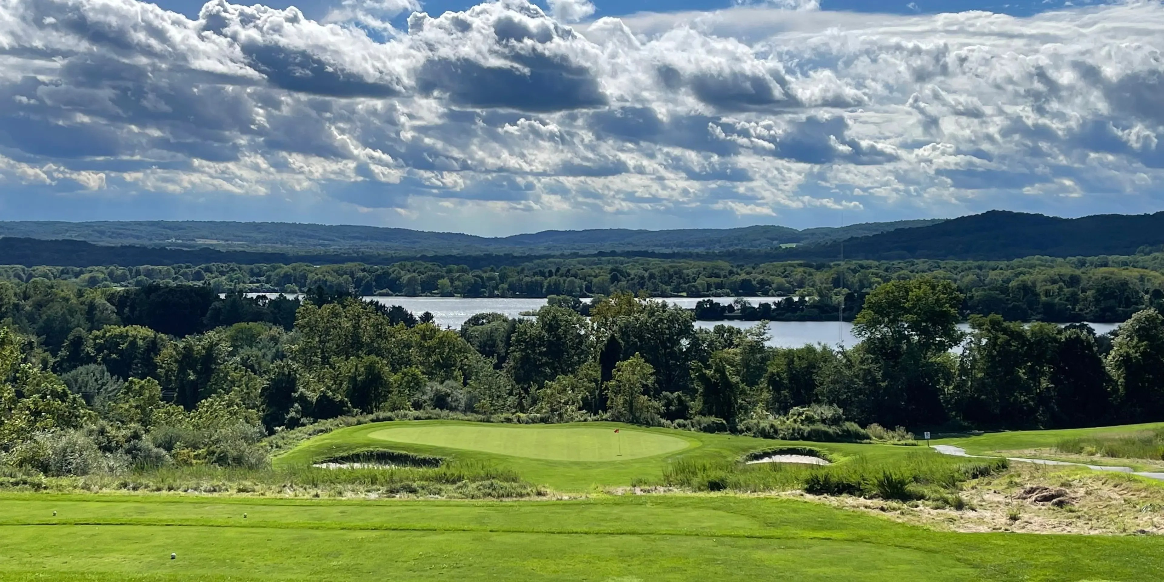 Landscape putting greens and fairway photo of the High Bridge Hills Golf Club golf course