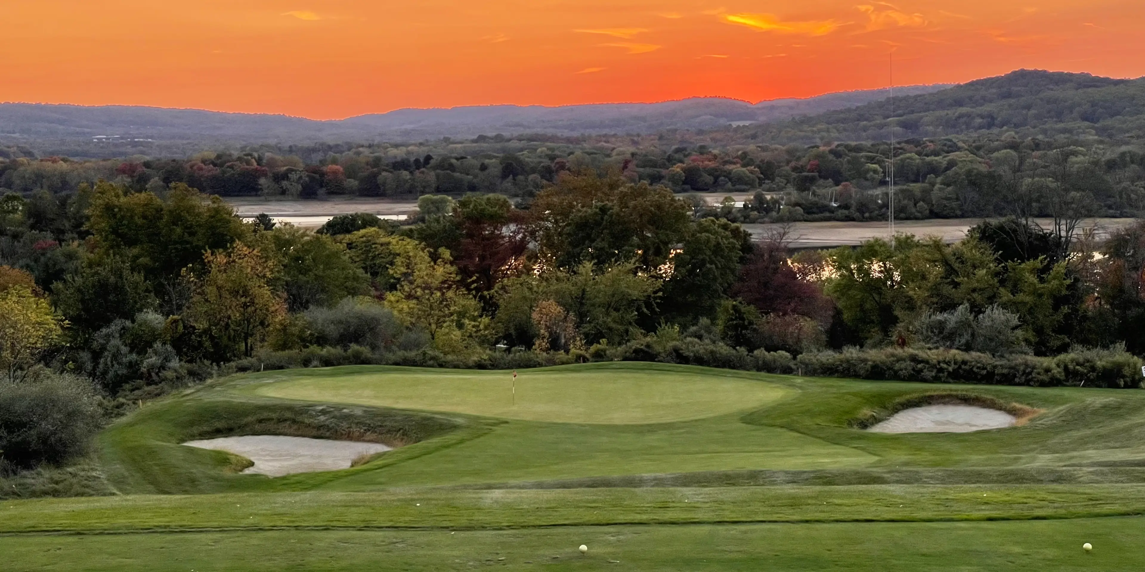 Landscape putting greens and fairway photo of the High Bridge Hills Golf Club golf course