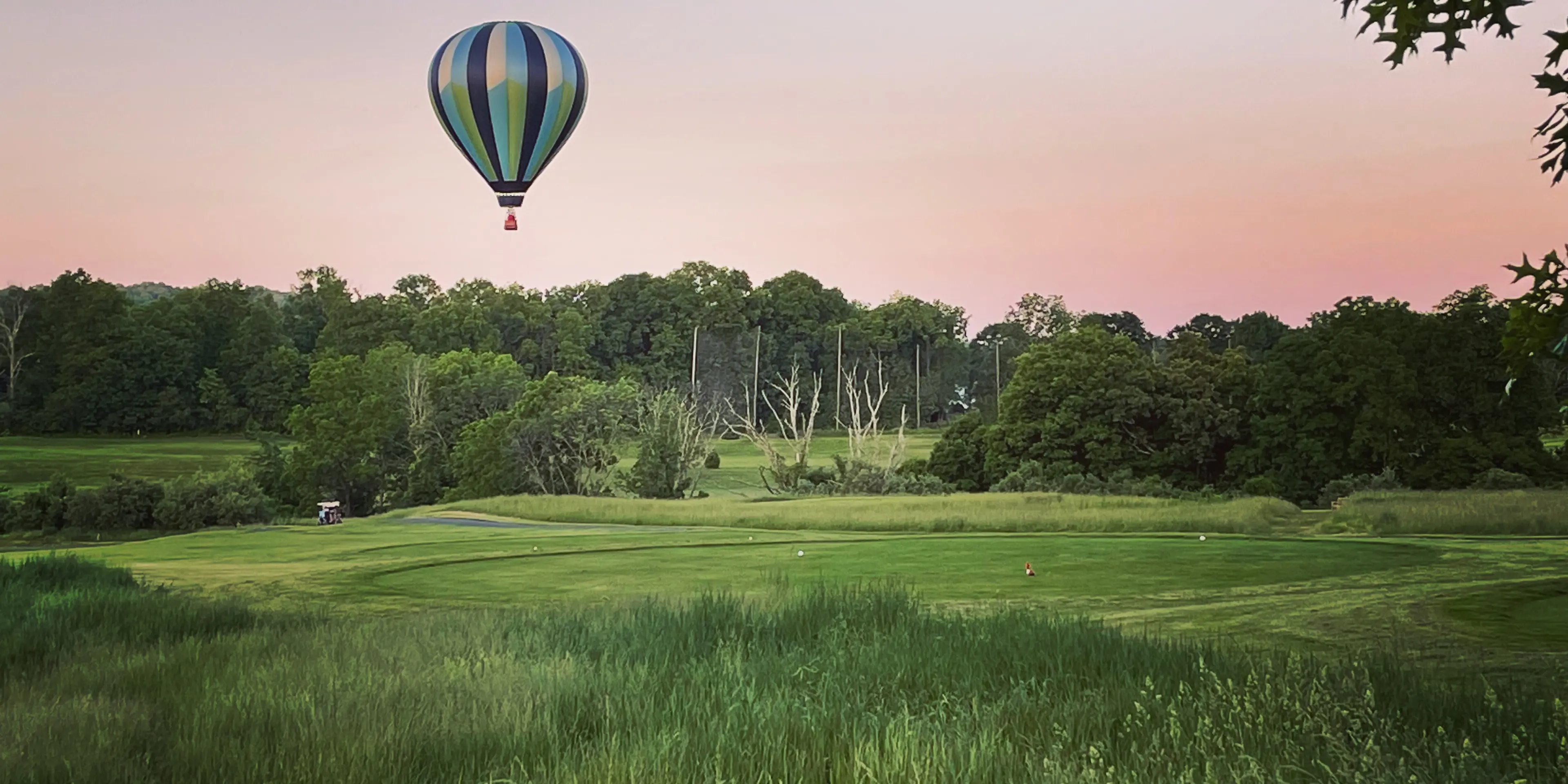 Landscape putting greens and fairway photo of the High Bridge Hills Golf Club golf course