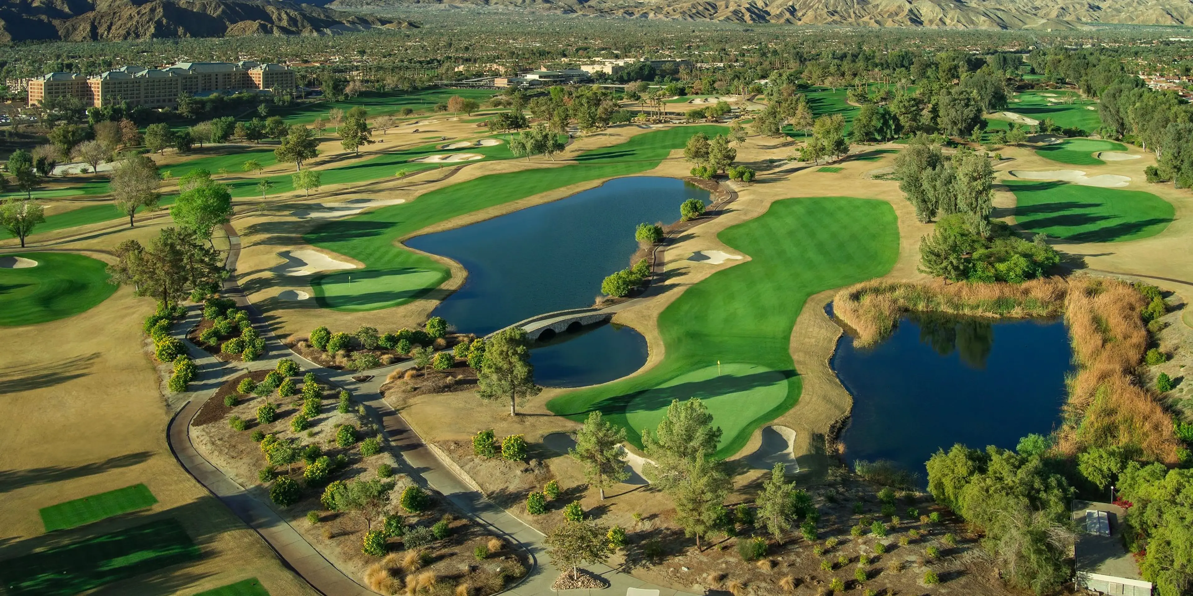 Landscape putting greens and fairway photo of the Indian Wells Golf Resort golf course