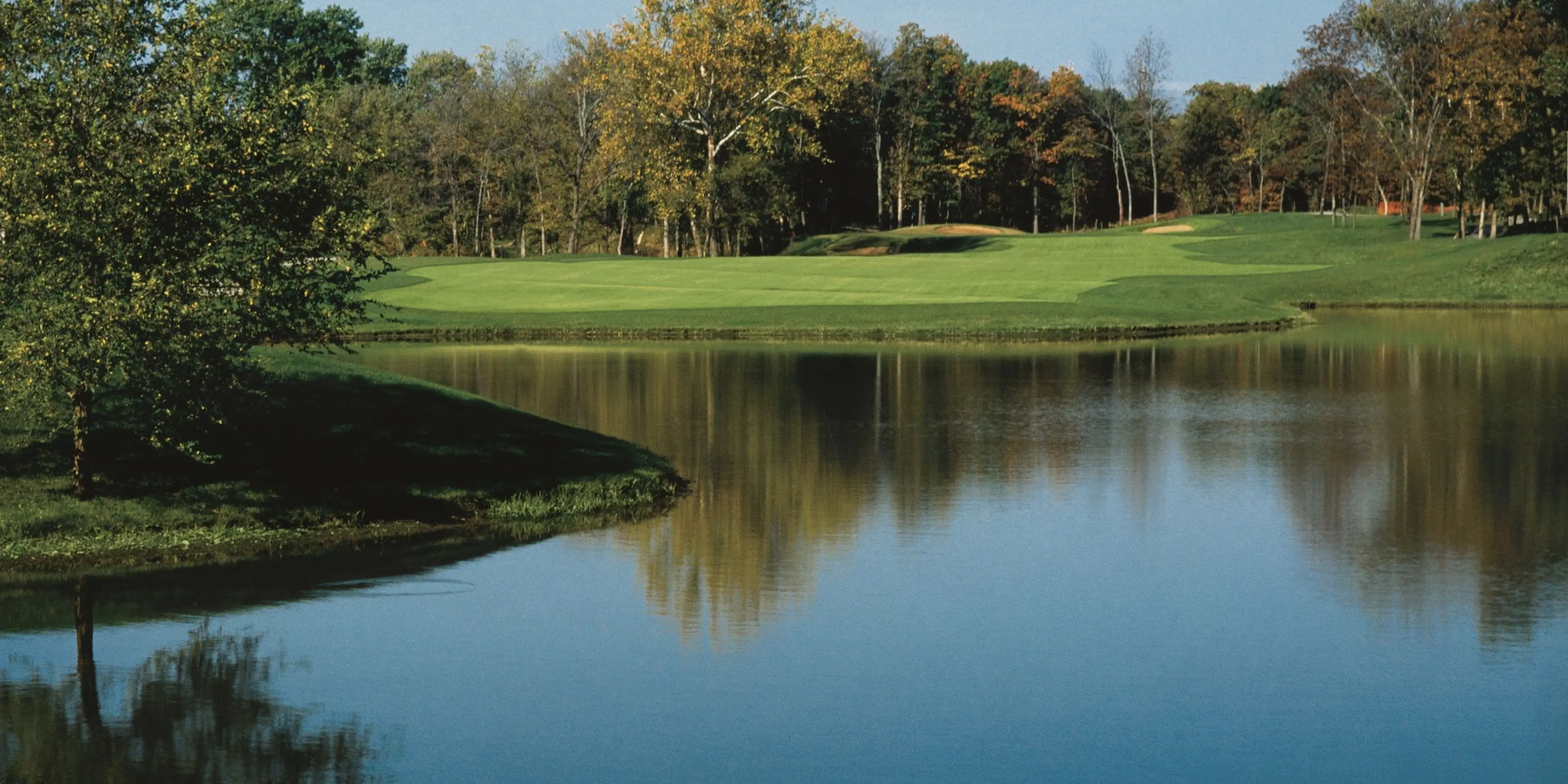 Landscape putting greens and fairway photo of the Ironhorse Golf Club golf course