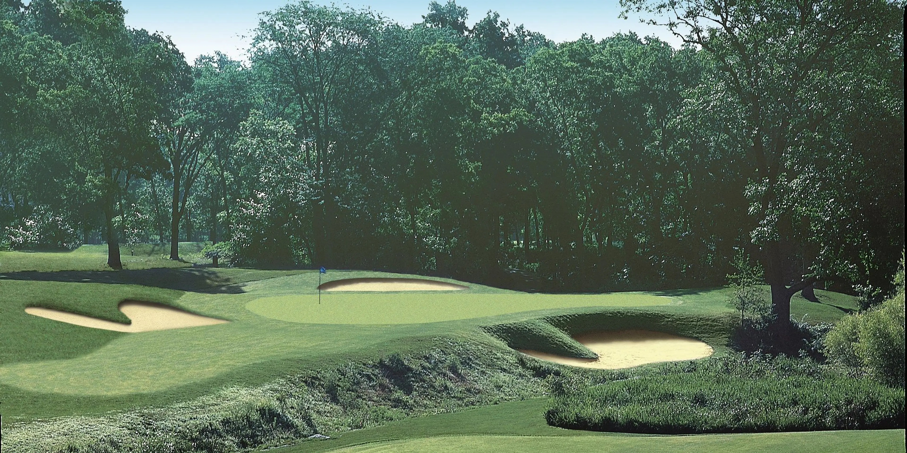 Landscape putting greens and fairway photo of the Ironhorse Golf Club golf course