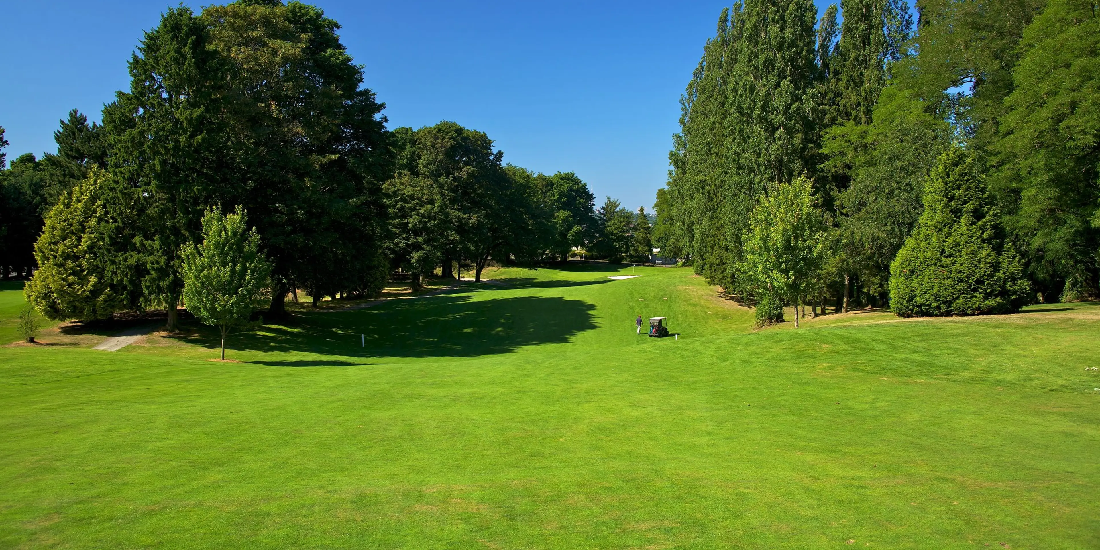 Landscape putting greens and fairway photo of the Bill Wright Golf Complex golf course