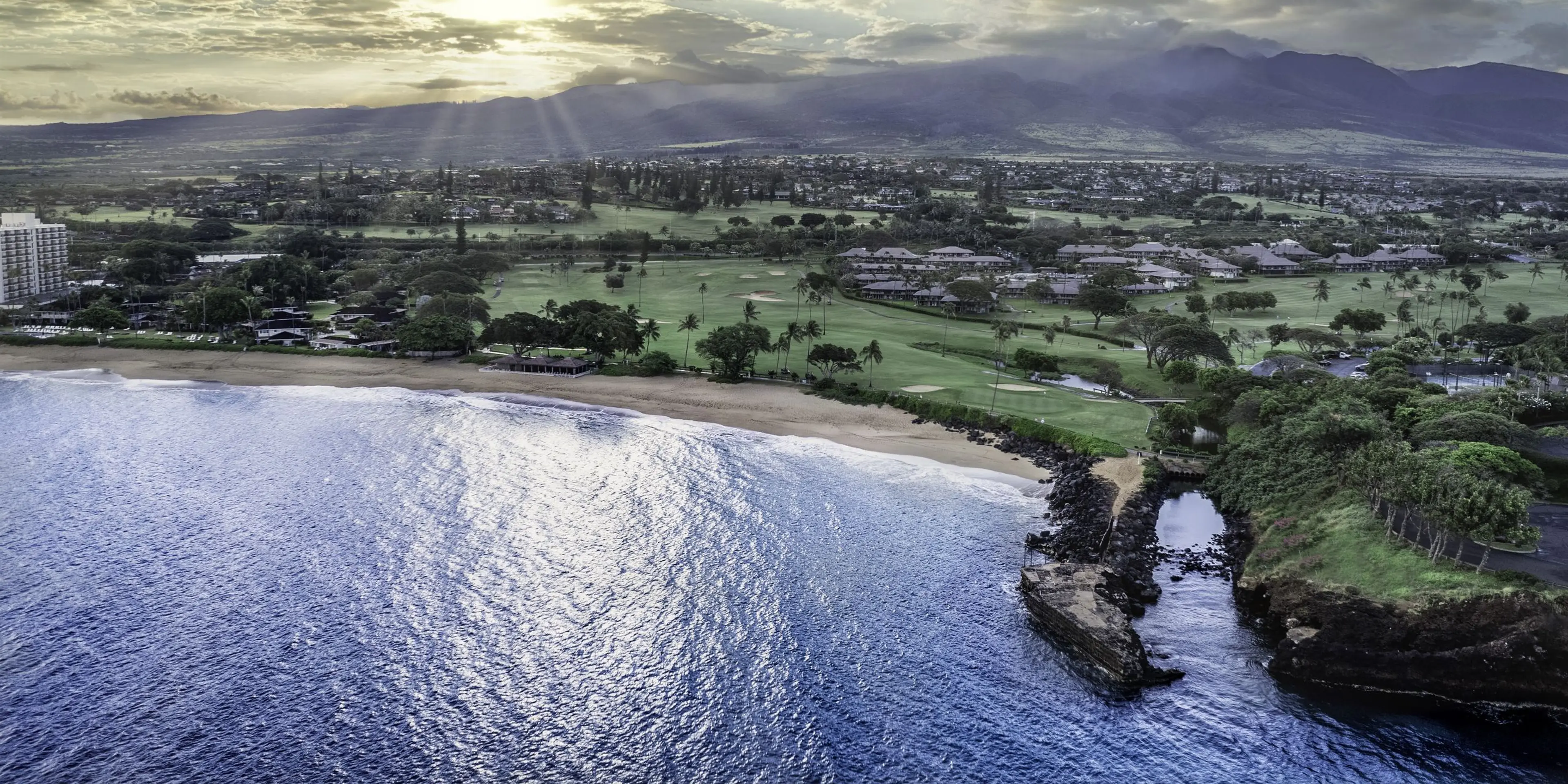 Landscape putting greens and fairway photo of the Ka'anapali Golf Courses golf course