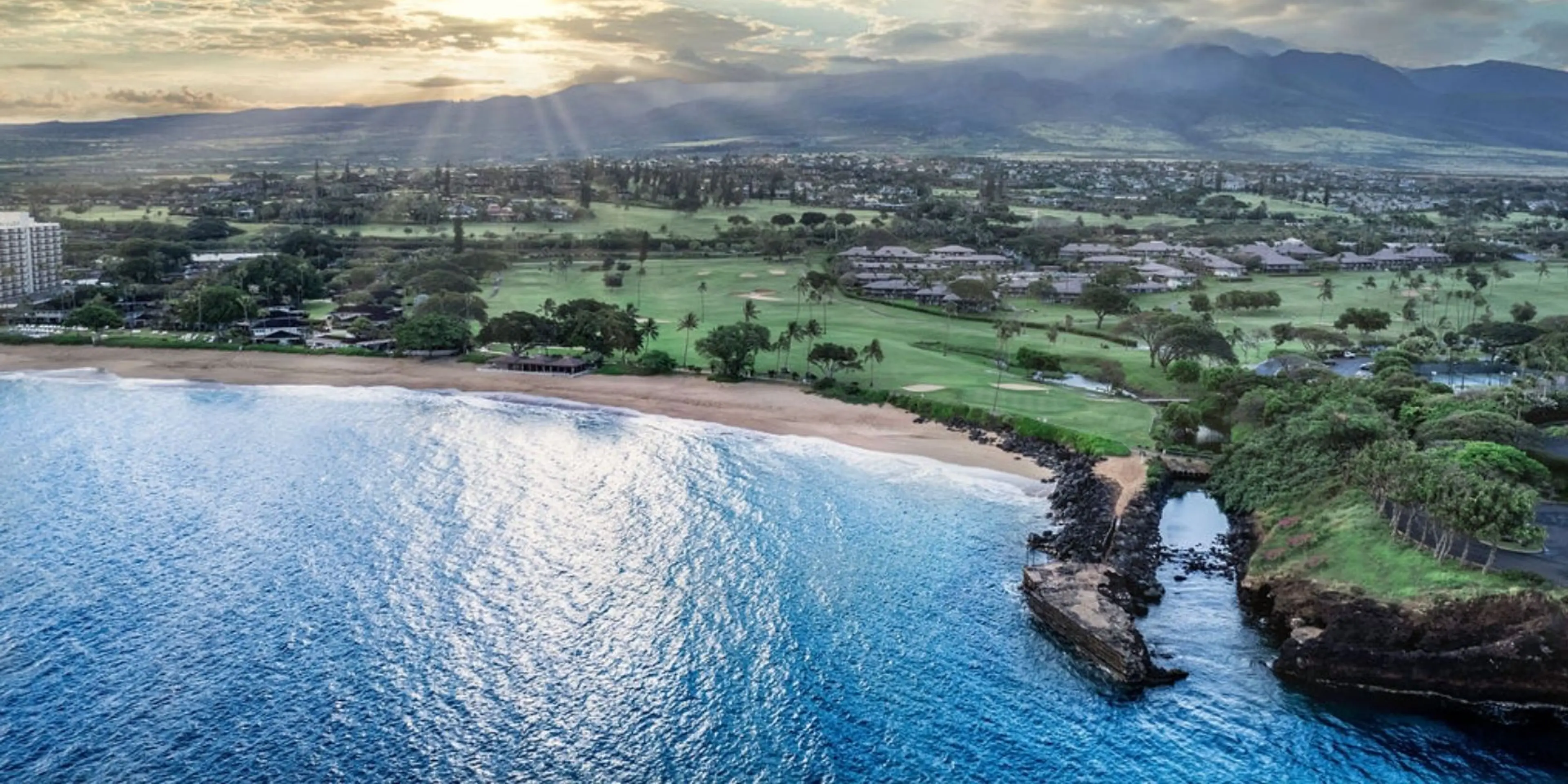 Landscape putting greens and fairway photo of the Ka'anapali Golf Courses golf course