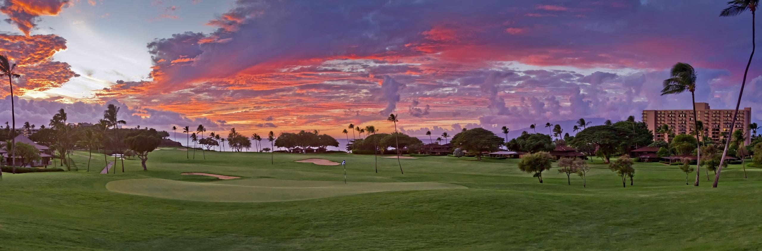 Landscape putting greens and fairway photo of the Ka'anapali Golf Courses golf course