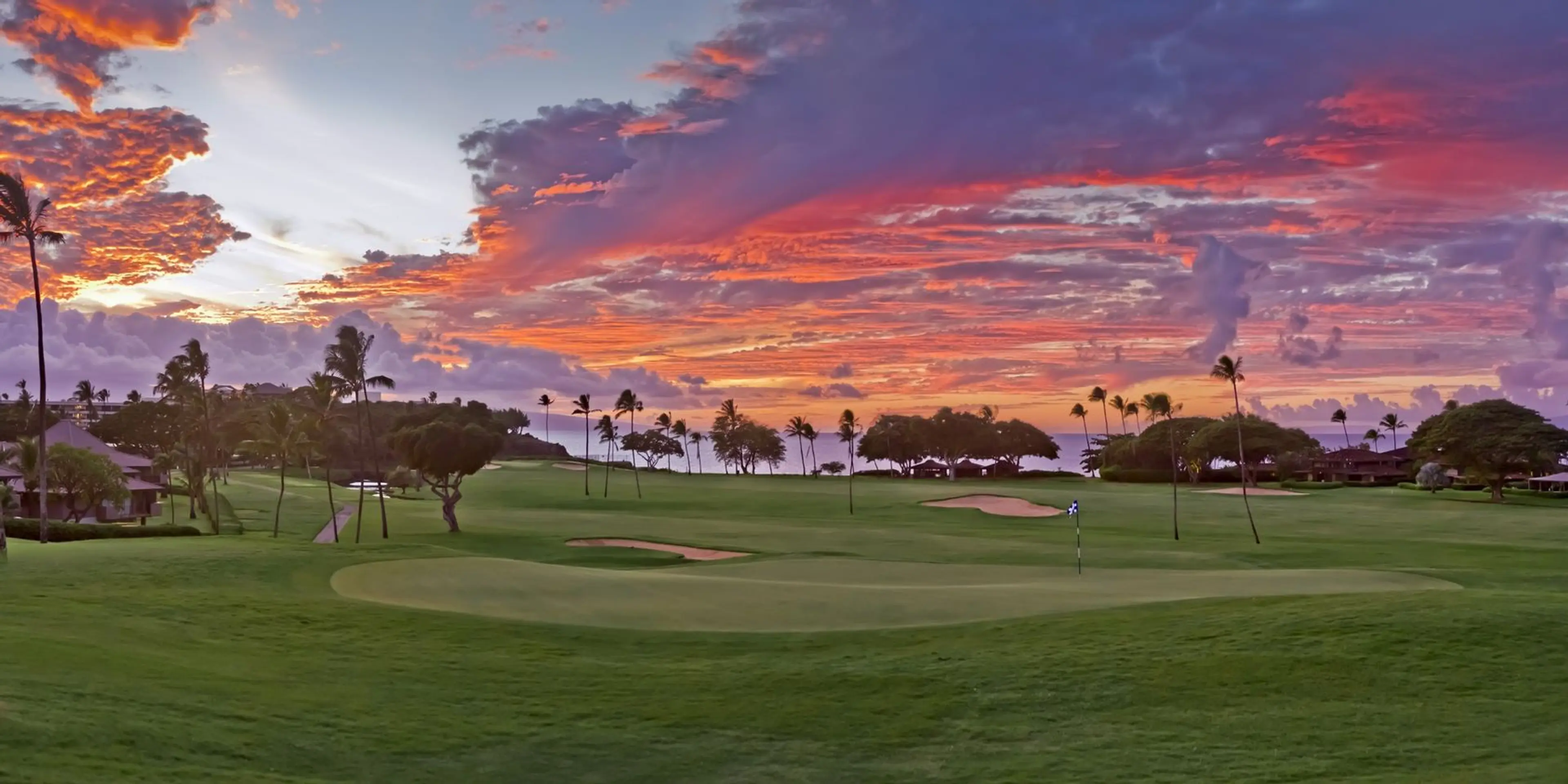 Landscape putting greens and fairway photo of the Ka'anapali Golf Courses golf course