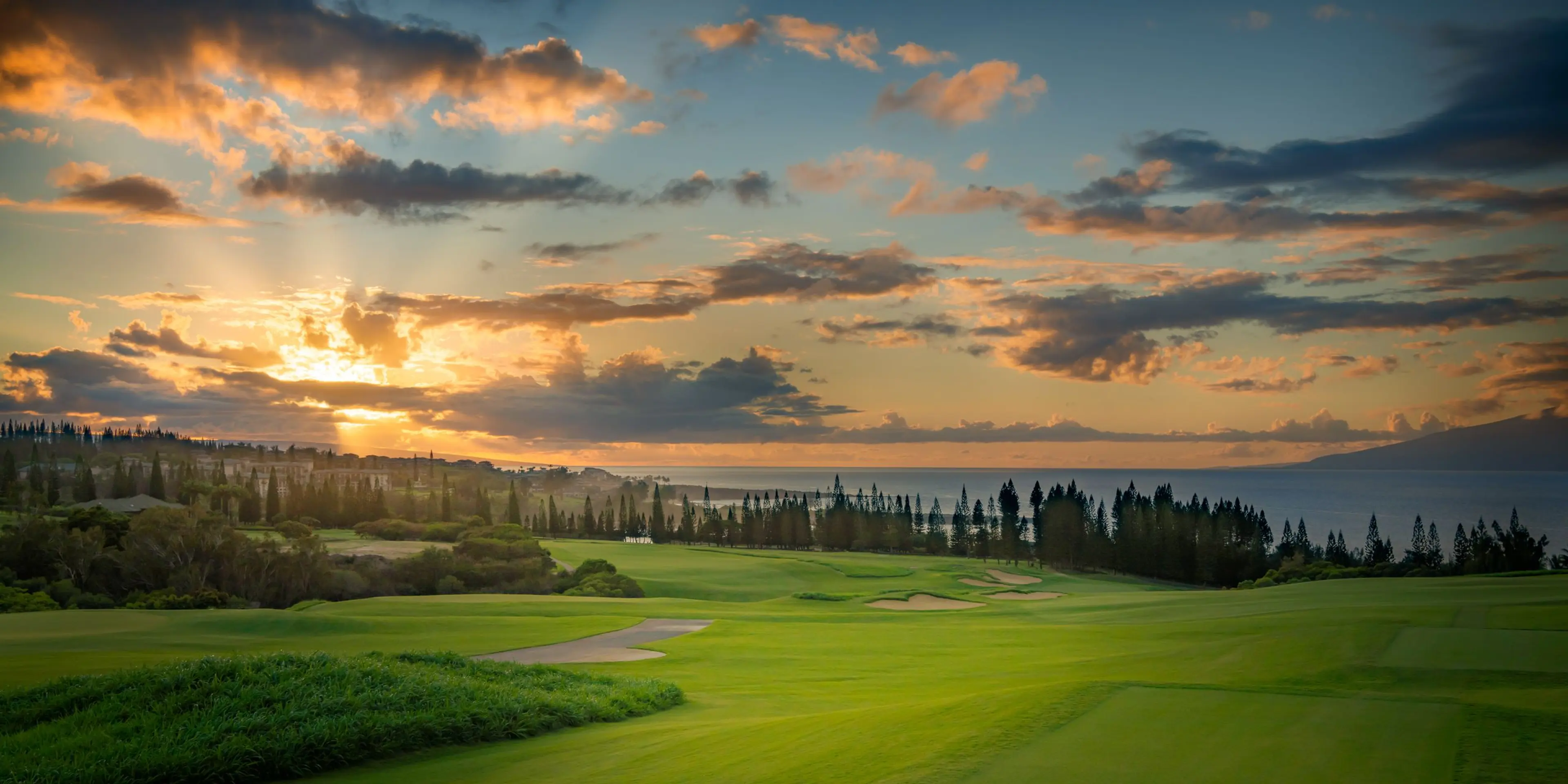 Landscape putting greens and fairway photo of the Kapalua golf course