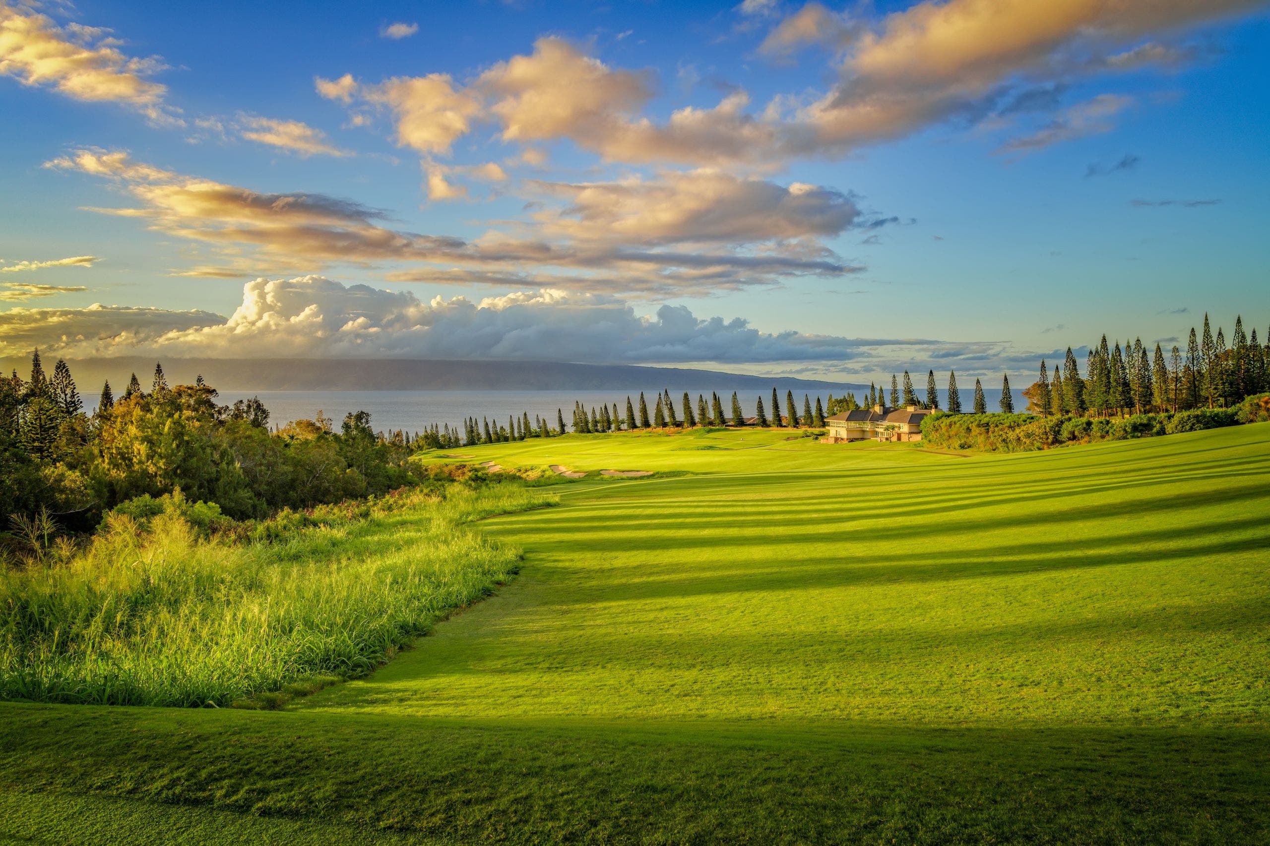 Landscape putting greens and fairway photo of the Kapalua golf course