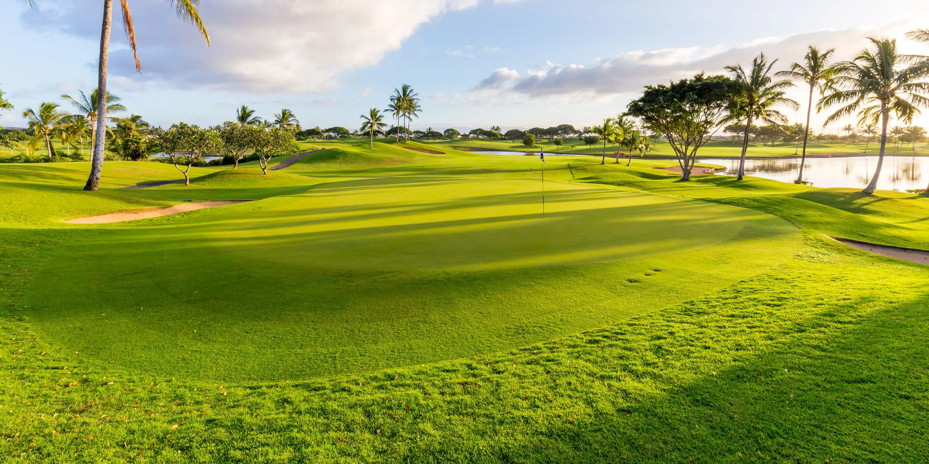 Landscape putting greens and fairway photo of the Kapolei Golf Club golf course