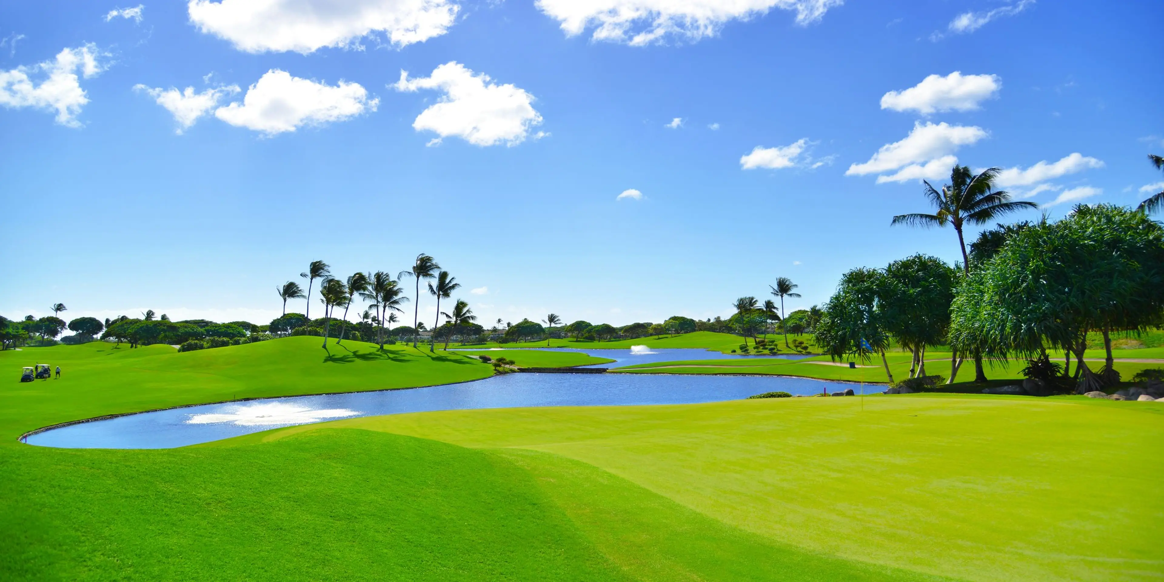Landscape putting greens and fairway photo of the Kapolei Golf Club golf course