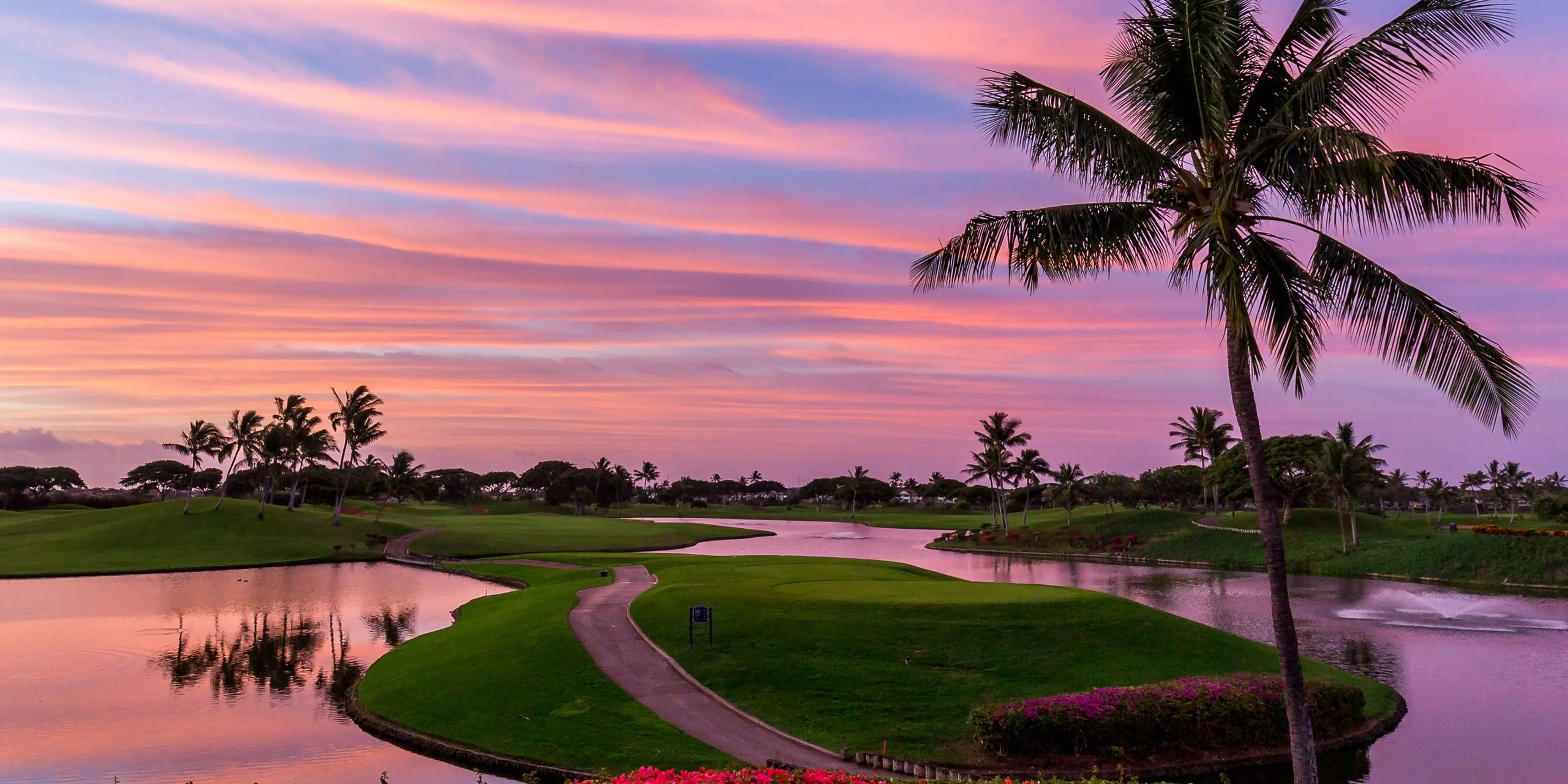 Landscape putting greens and fairway photo of the Kapolei Golf Club golf course