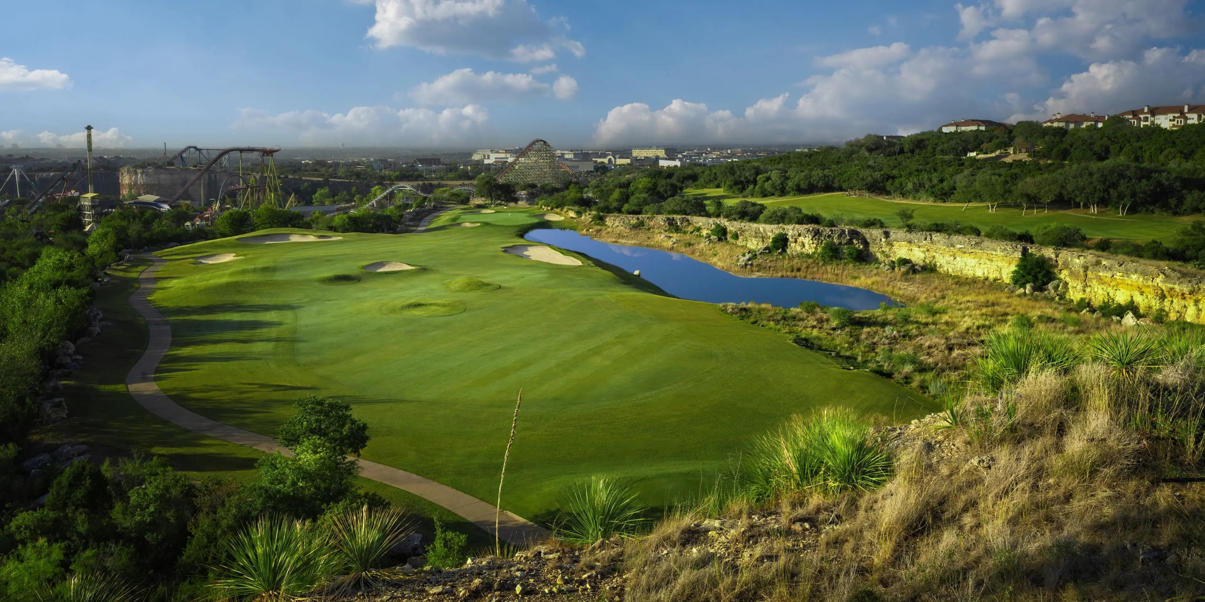 Landscape putting greens and fairway photo of the La Cantera Golf Club golf course