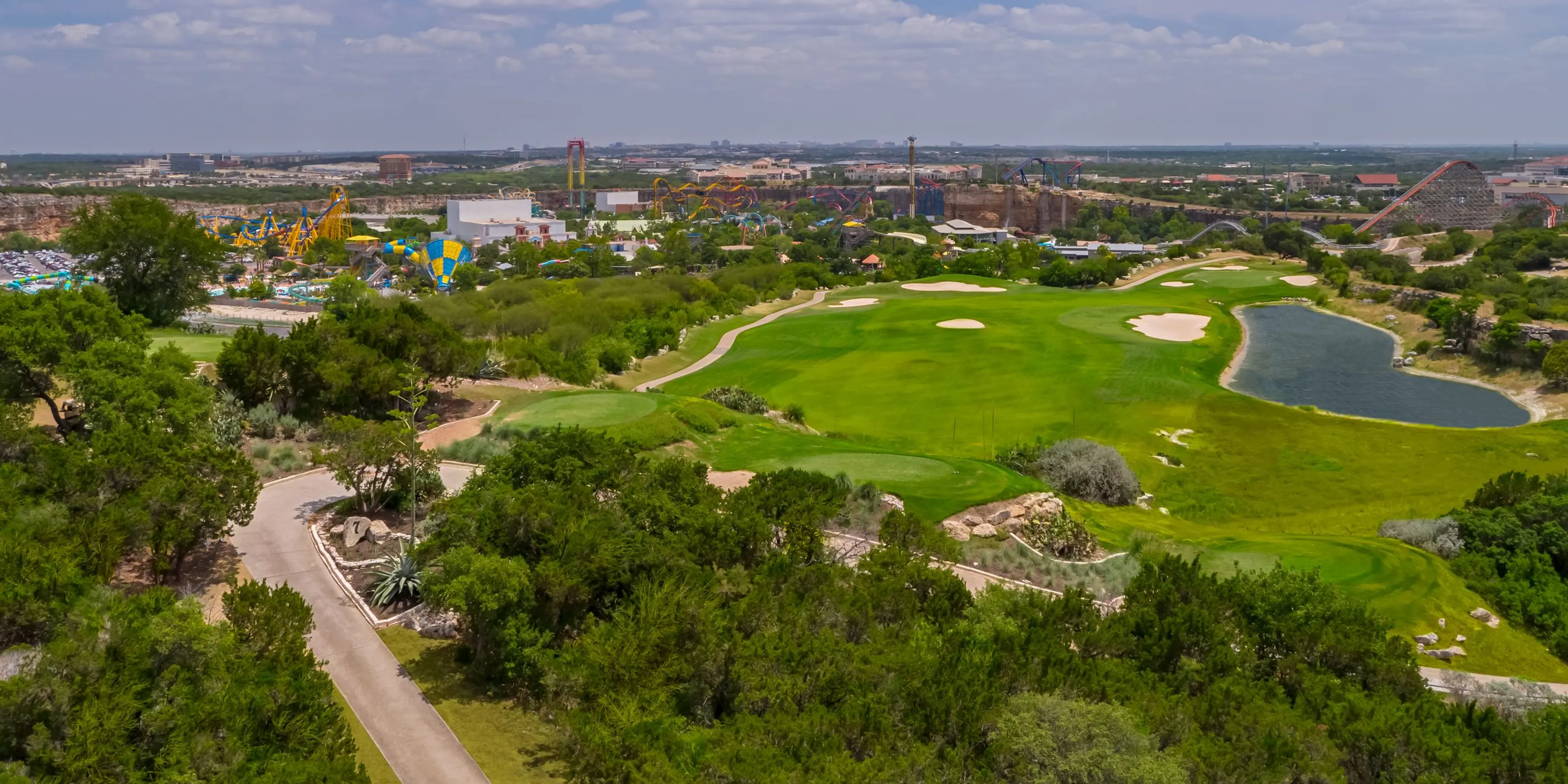 Landscape putting greens and fairway photo of the La Cantera Golf Club golf course