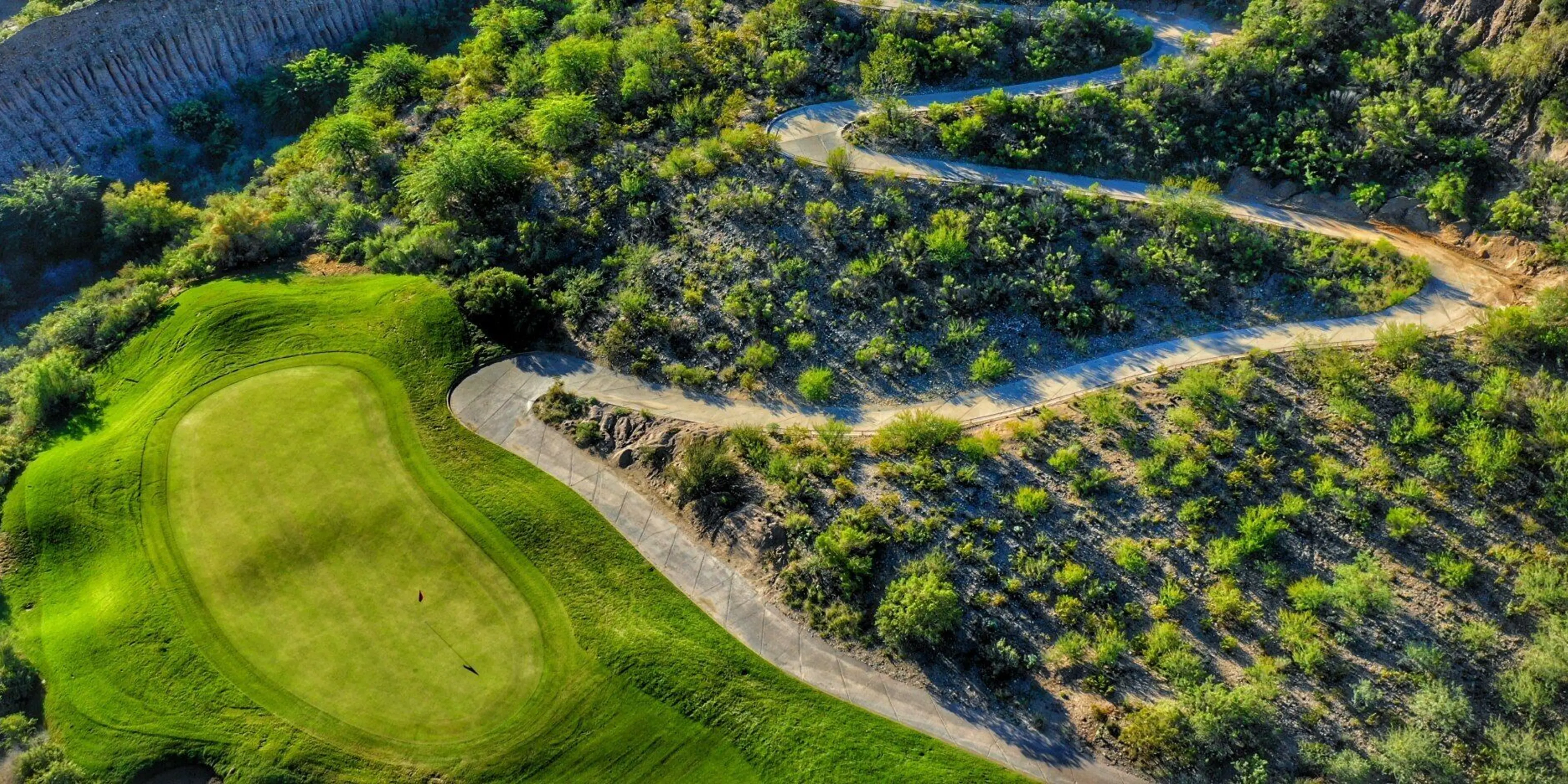 Landscape putting greens and fairway photo of the Lake Monticello Golf Course golf course
