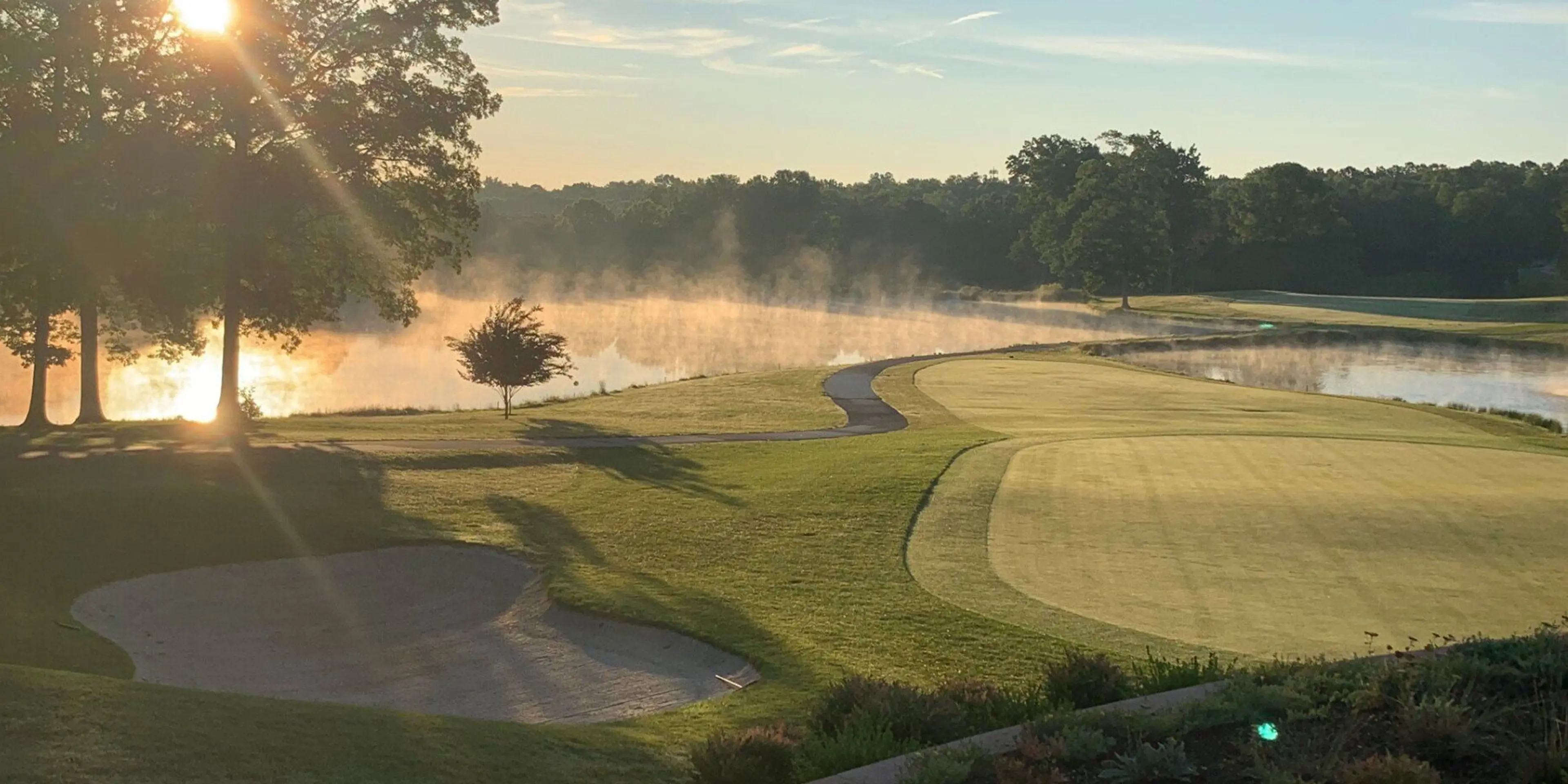 Landscape putting greens and fairway photo of the Lake Monticello Golf Course golf course
