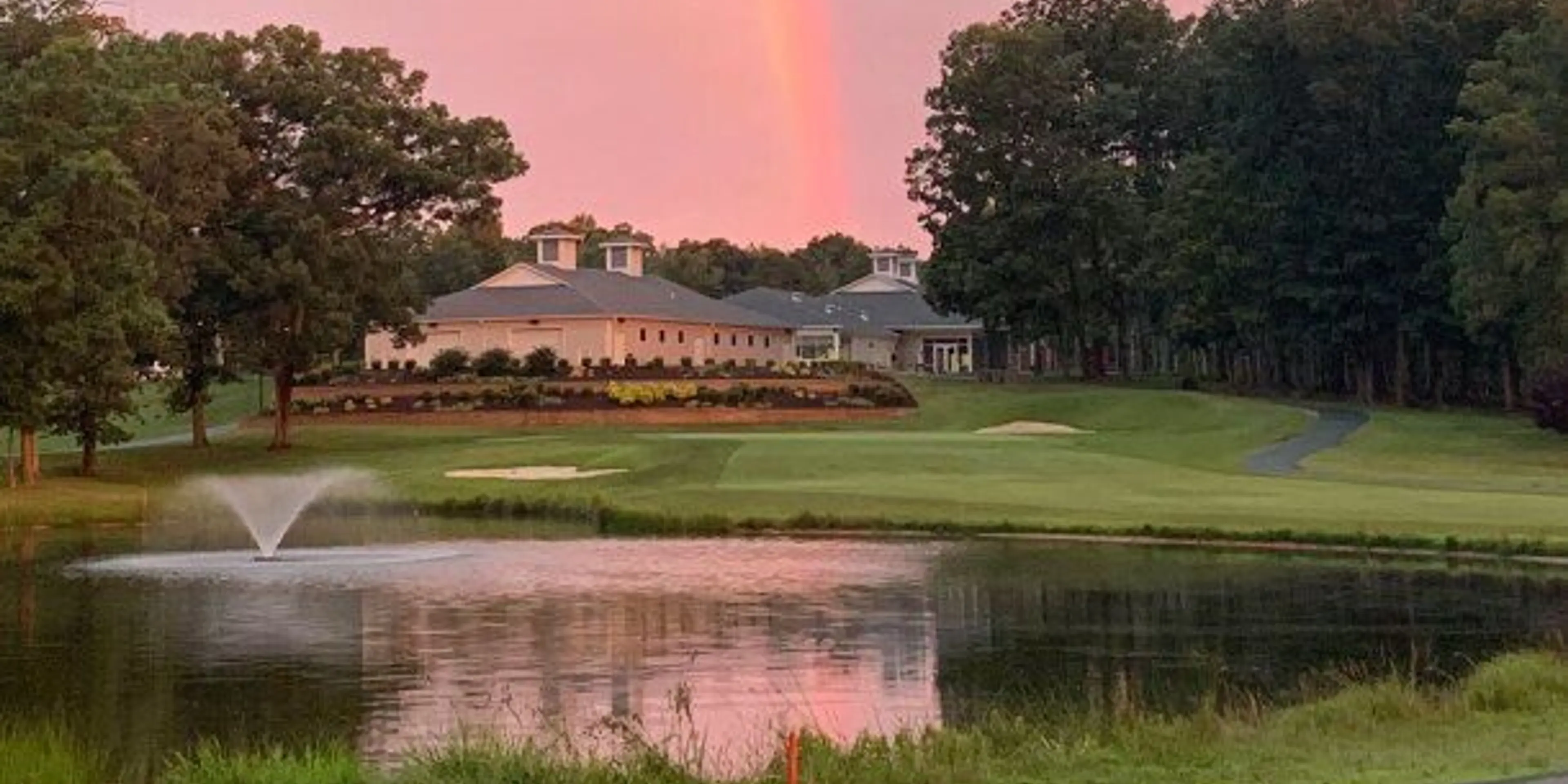 Landscape putting greens and fairway photo of the Lake Monticello Golf Course golf course