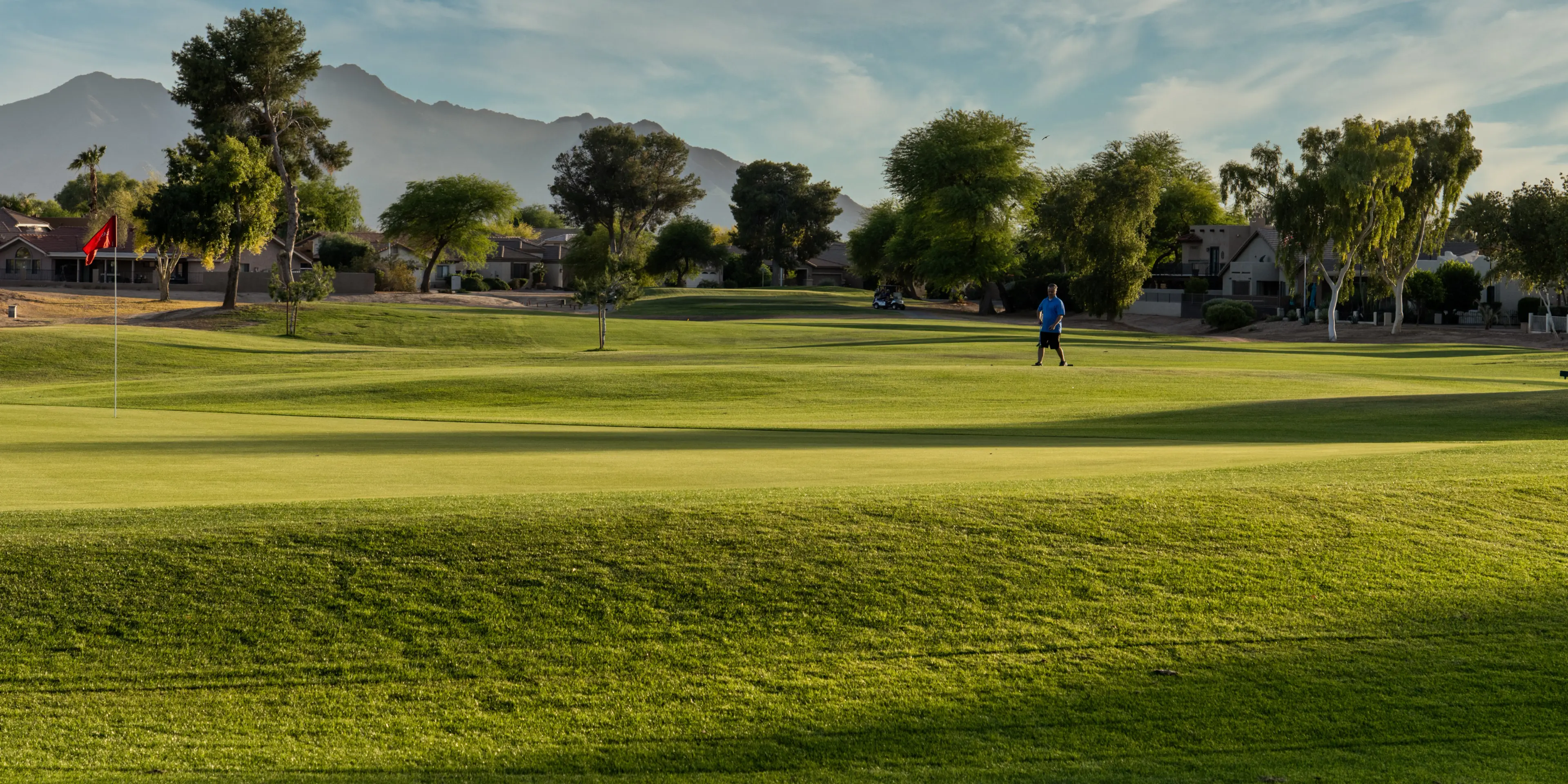 Landscape putting greens and fairway photo of the Las Colinas Golf Club golf course