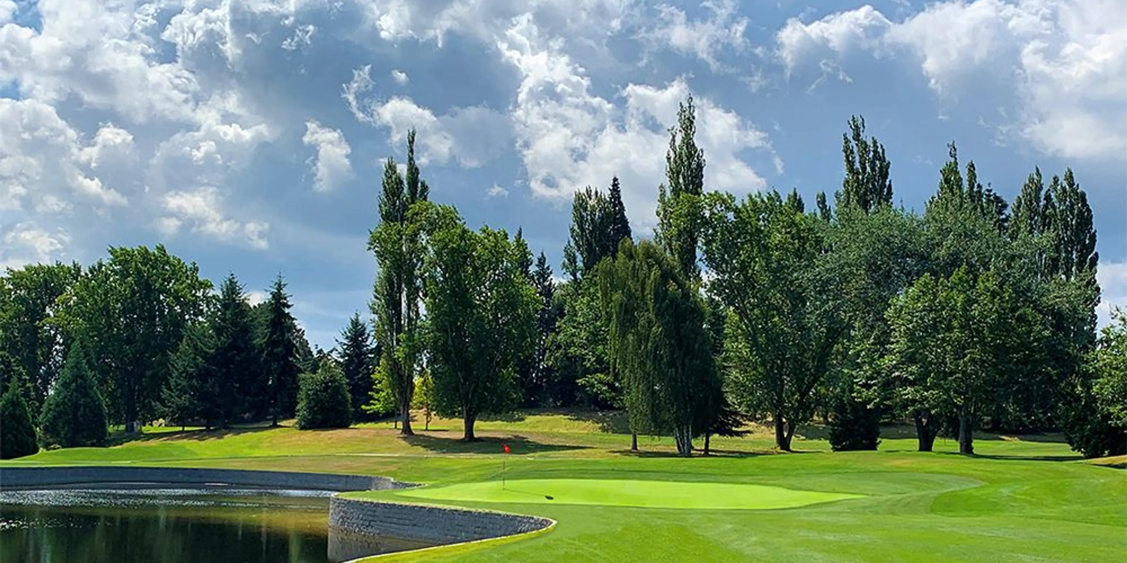 Landscape putting greens and fairway photo of the Legion Memorial Golf Course golf course