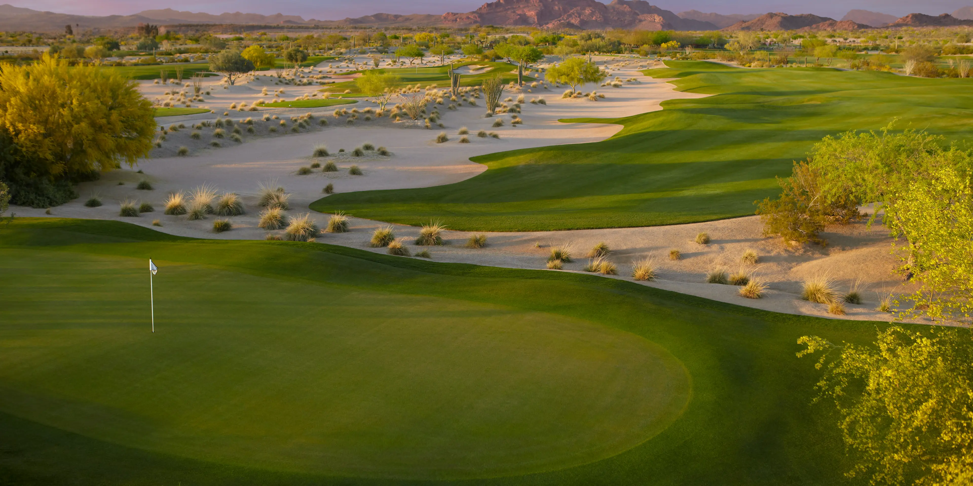 Landscape putting greens and fairway photo of the Longbow Golf Club golf course