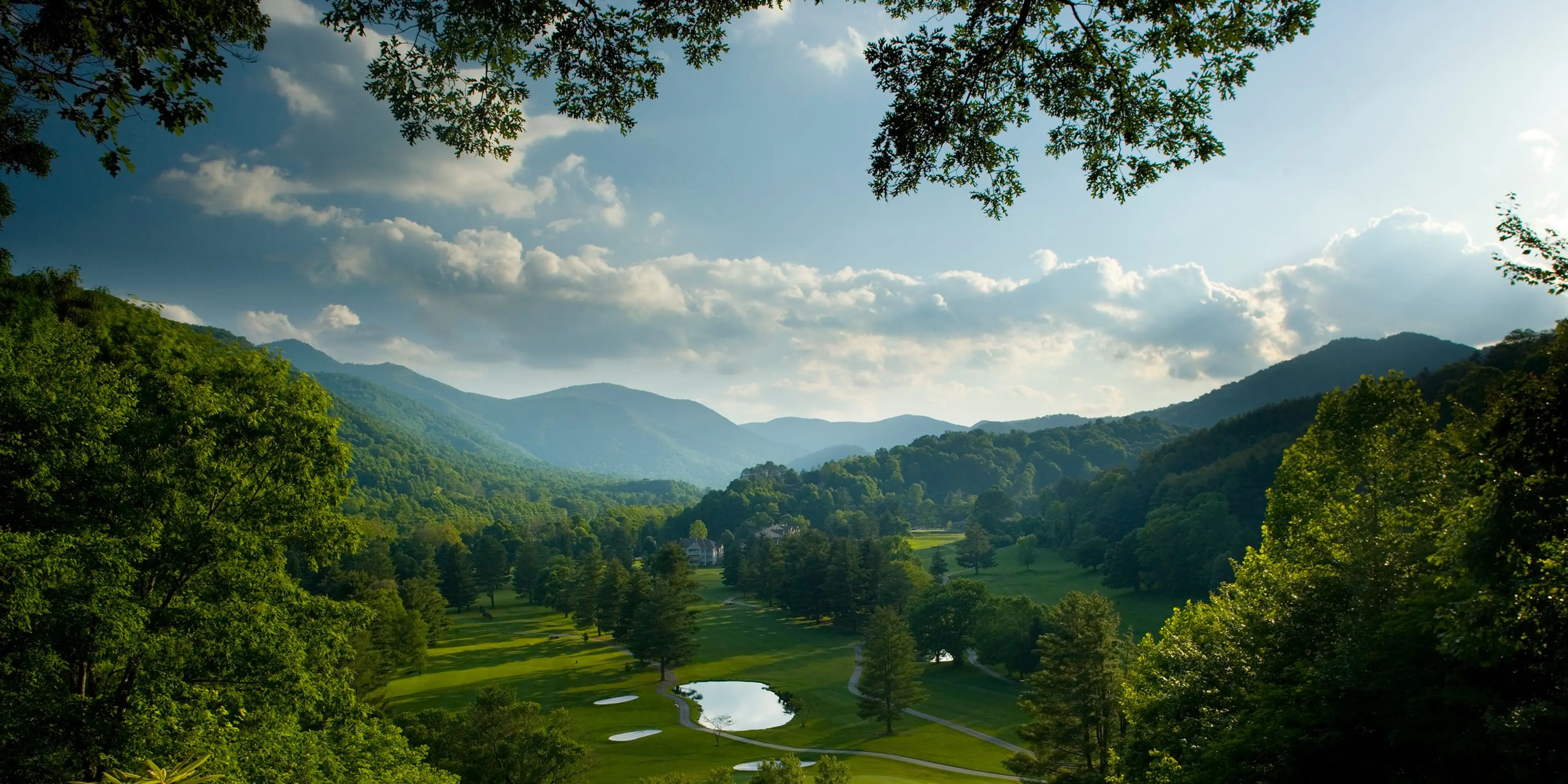 Landscape putting greens and fairway photo of the Maggie Valley Club & Resort golf course