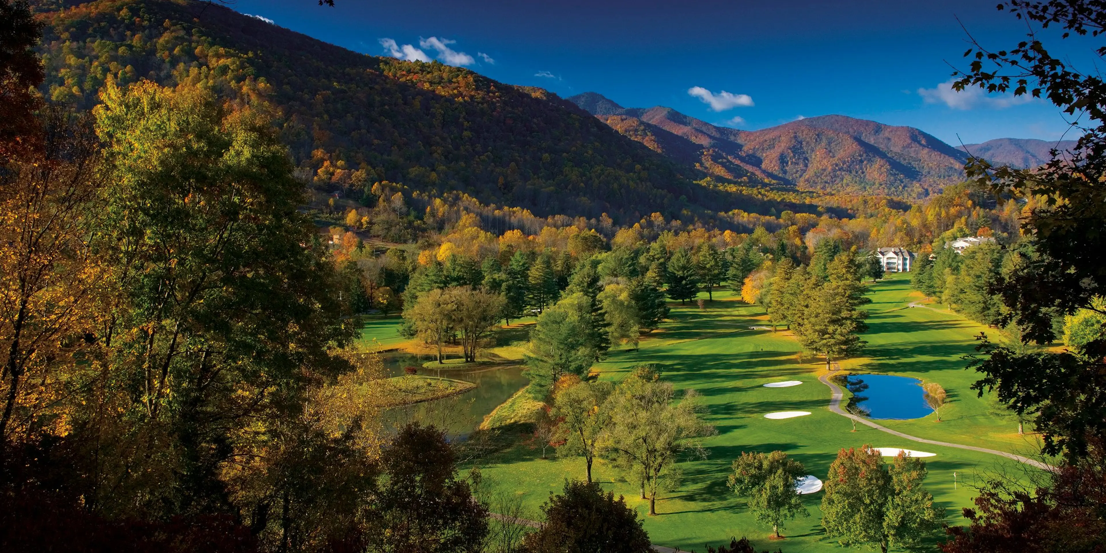 Landscape putting greens and fairway photo of the Maggie Valley Club & Resort golf course