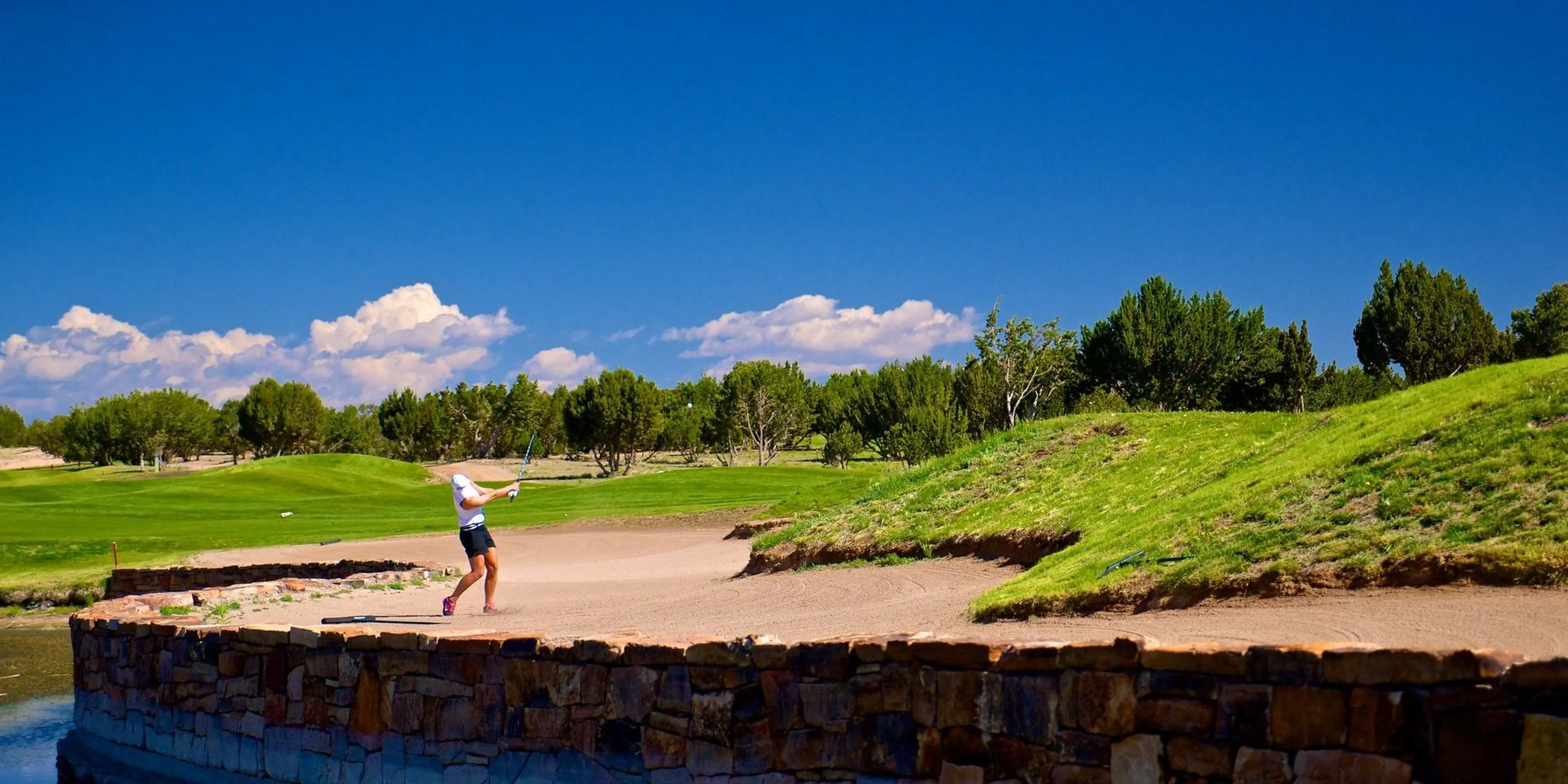 Landscape putting greens and fairway photo of the Marty Sanchez Links golf course