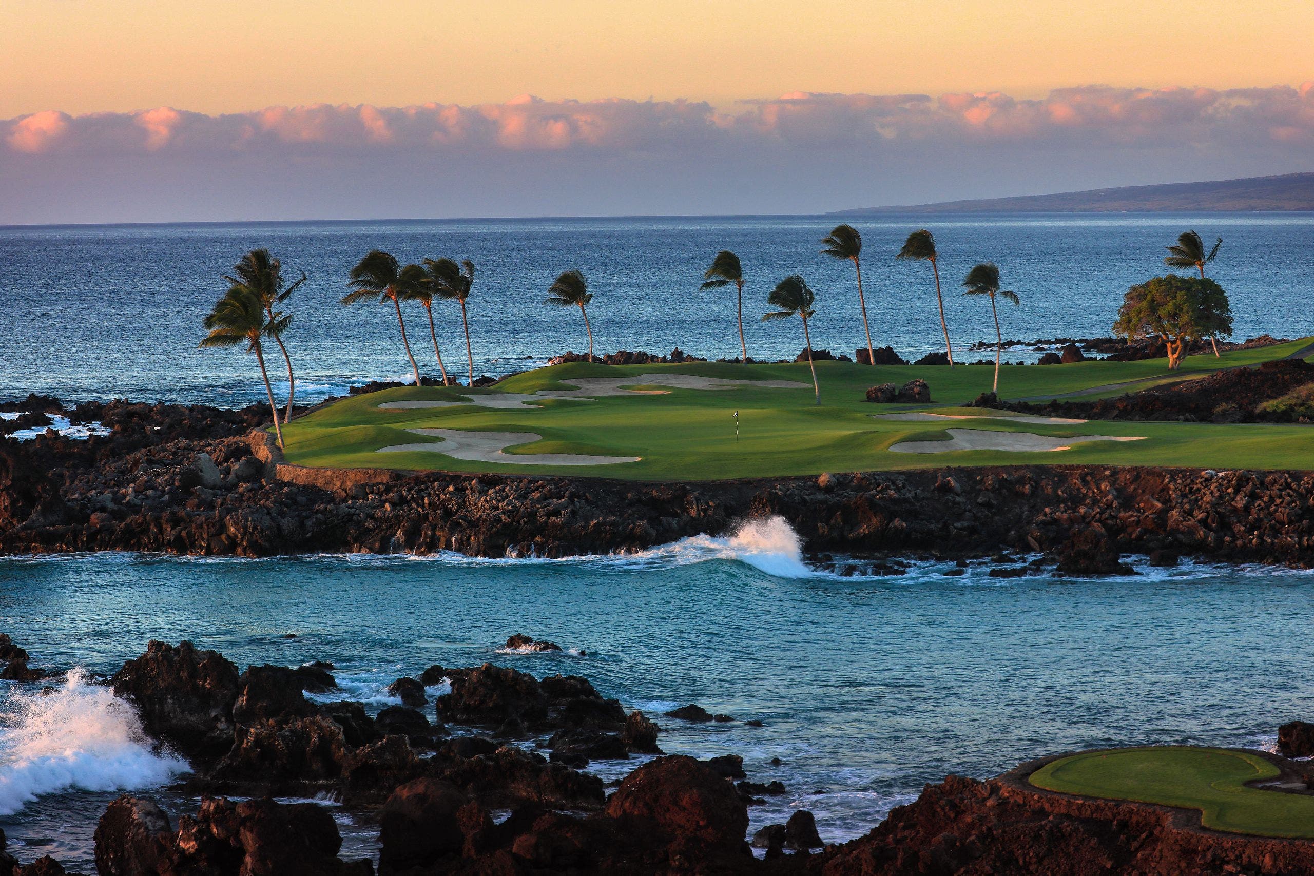 Landscape putting greens and fairway photo of the Mauna Lani Auberge Collection golf course