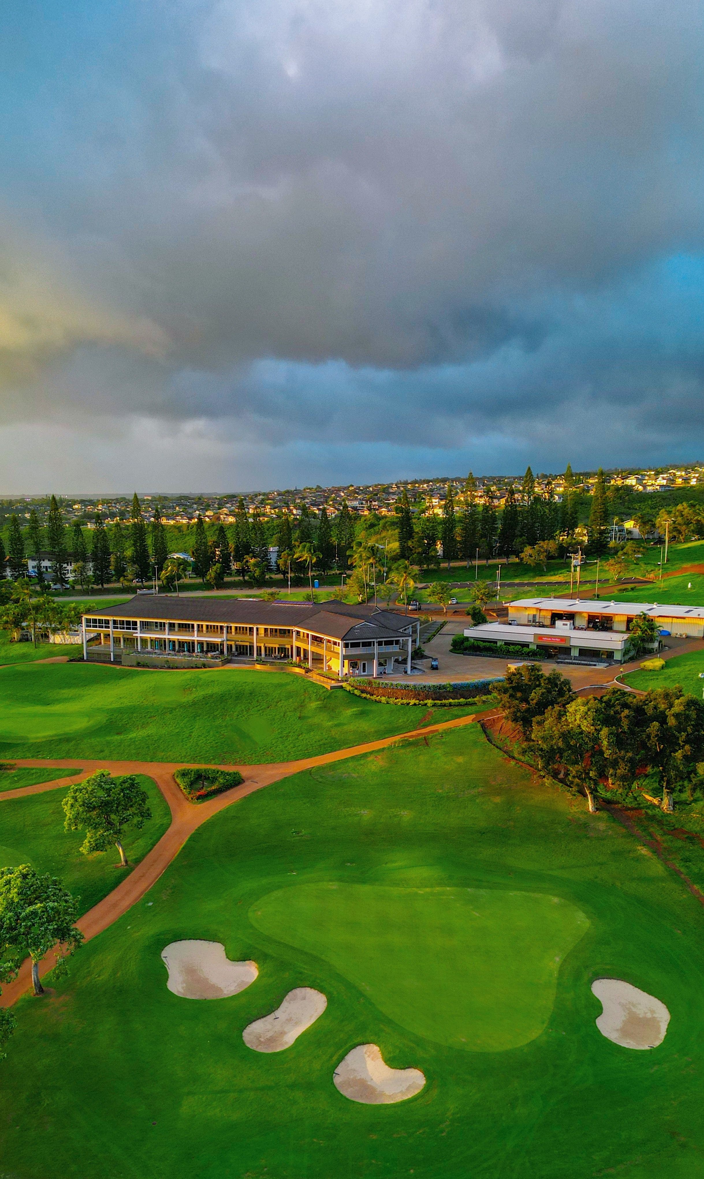Landscape putting greens and fairway photo of the Pearl at Kalauao golf course