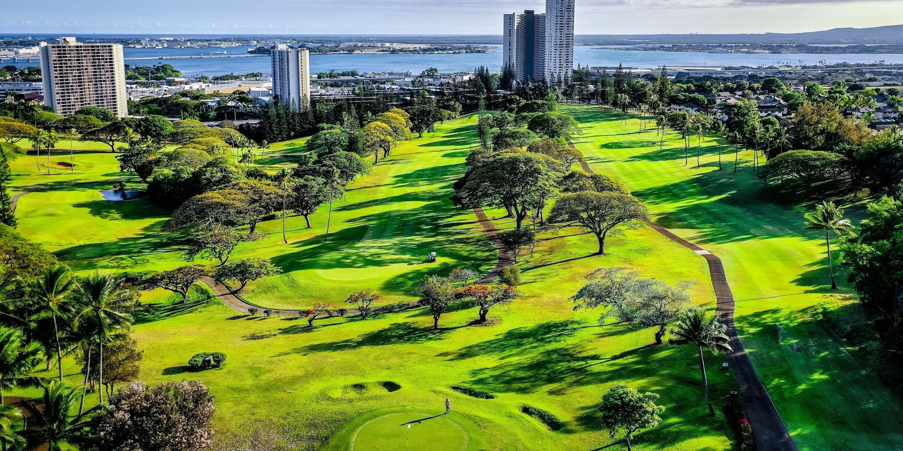 Landscape putting greens and fairway photo of the Pearl at Kalauao golf course
