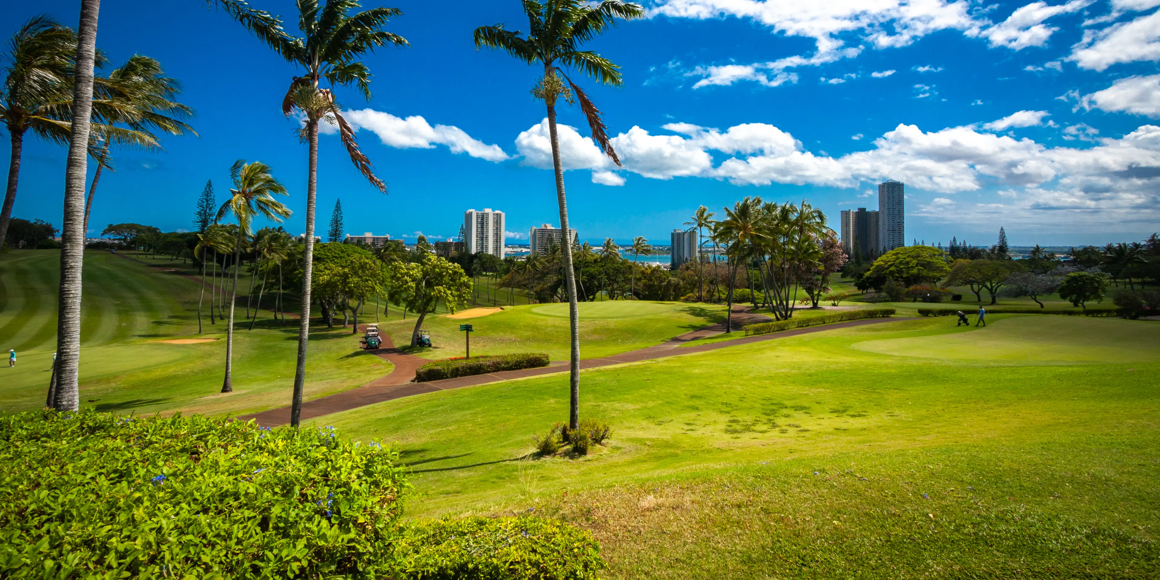 Landscape putting greens and fairway photo of the Pearl at Kalauao golf course