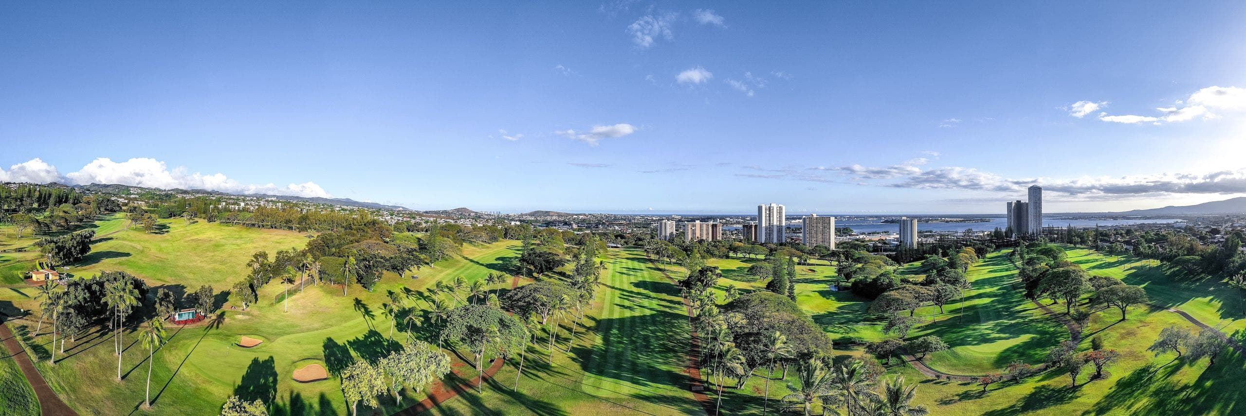 Landscape putting greens and fairway photo of the Pearl at Kalauao golf course