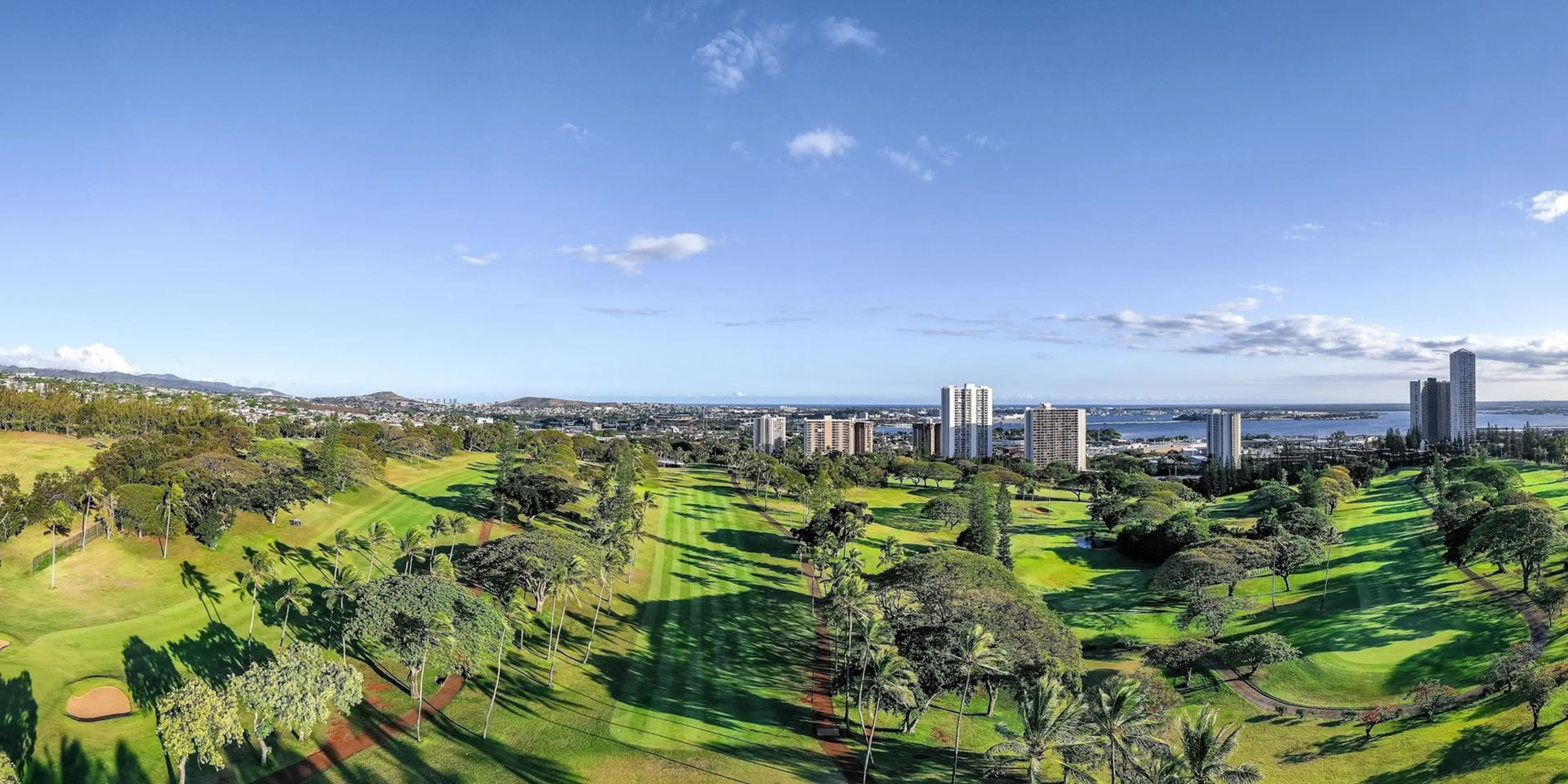 Landscape putting greens and fairway photo of the Pearl at Kalauao golf course