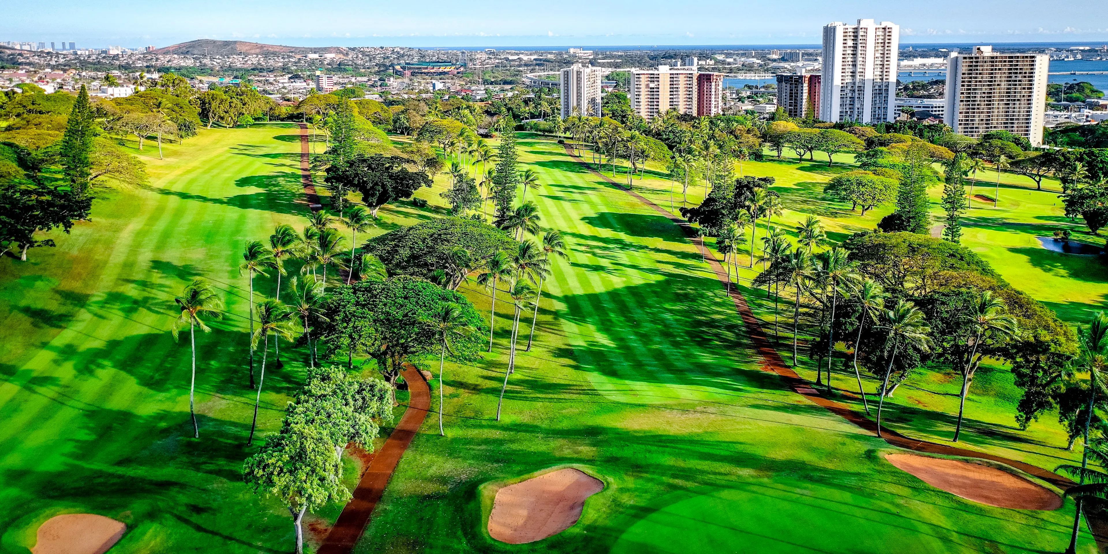 Landscape putting greens and fairway photo of the Pearl at Kalauao golf course