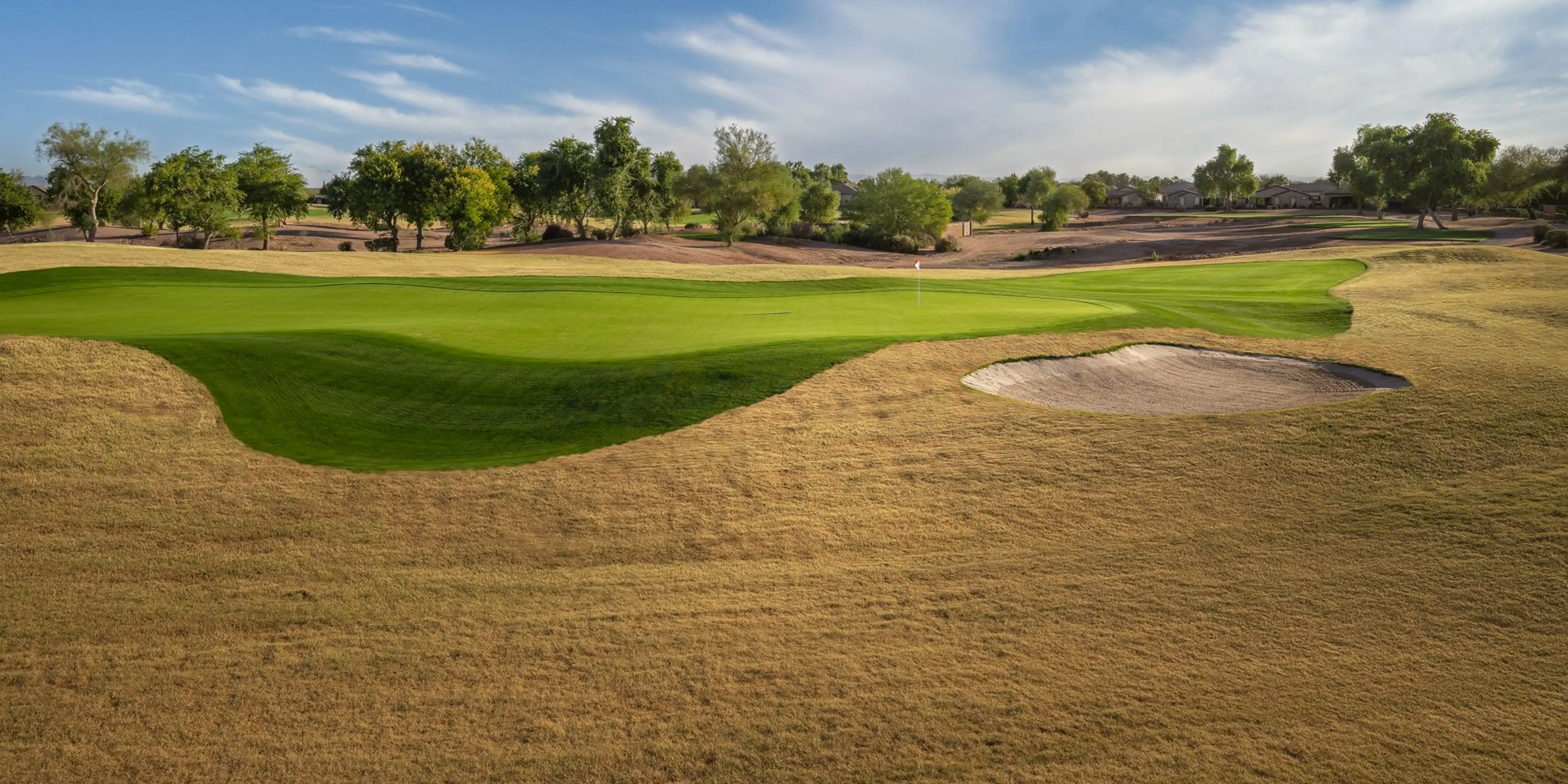Landscape putting greens and fairway photo of the Power Ranch Golf Club golf course