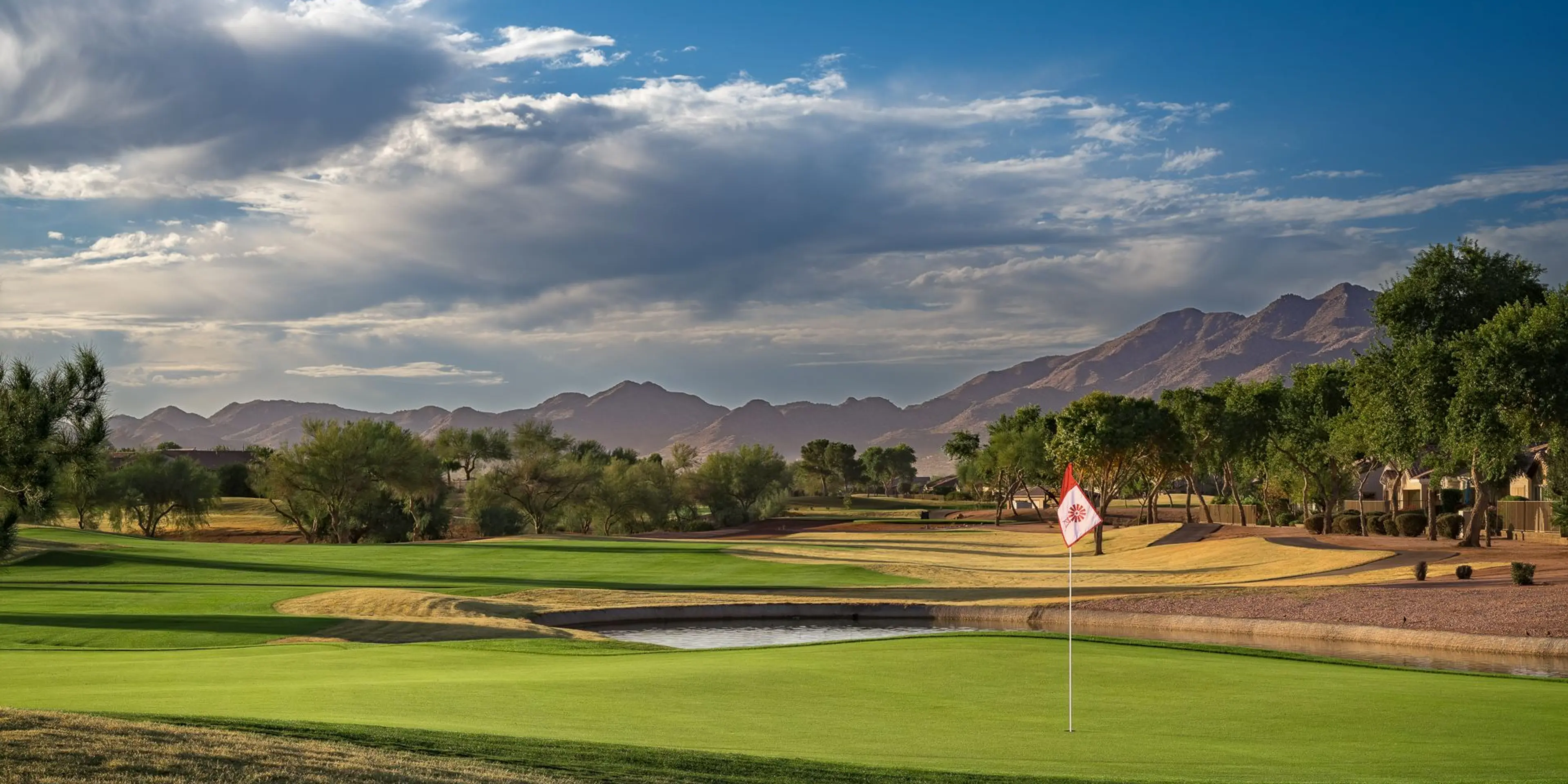Landscape putting greens and fairway photo of the Power Ranch Golf Club golf course