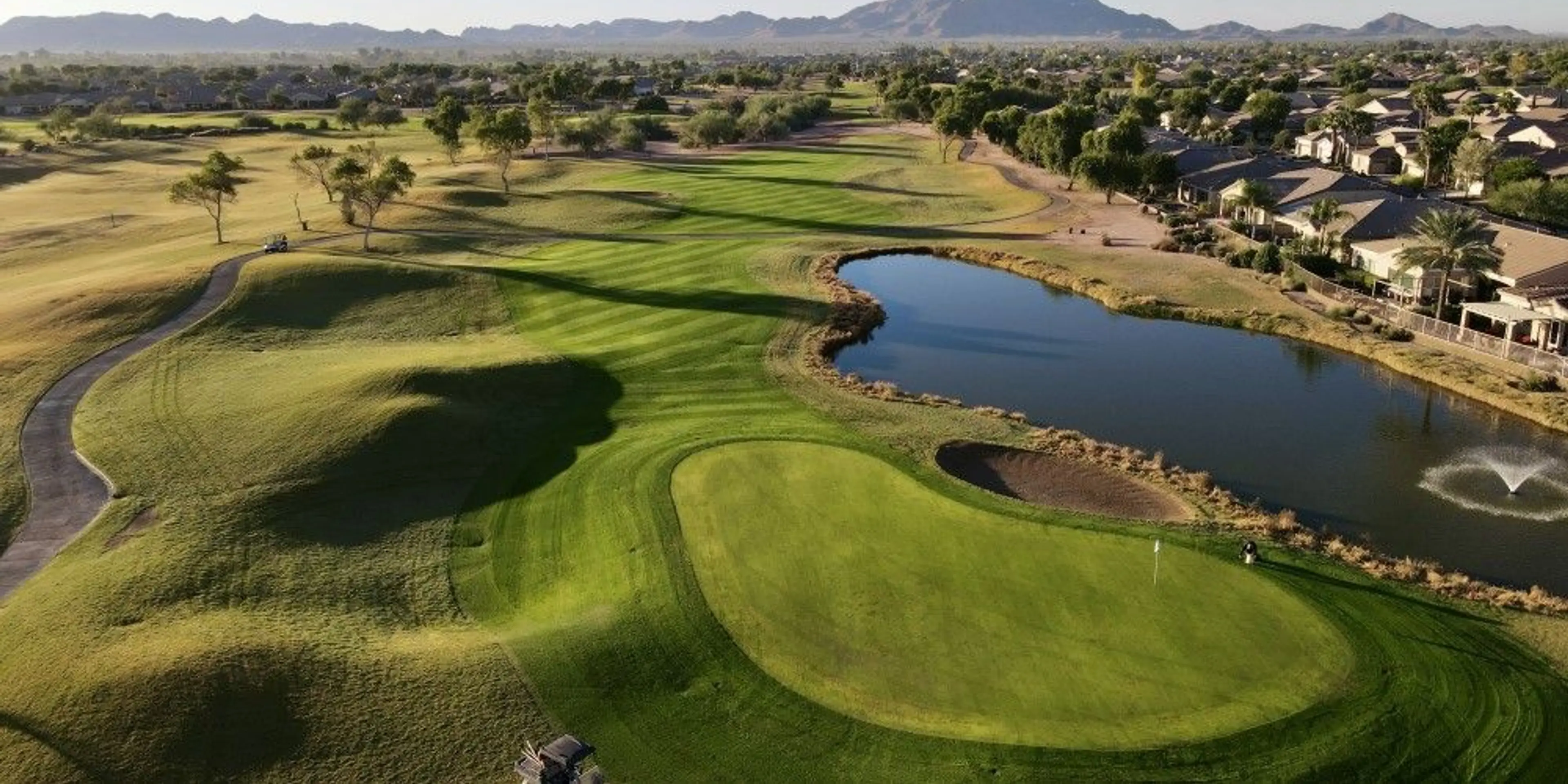 Landscape putting greens and fairway photo of the Power Ranch Golf Club golf course