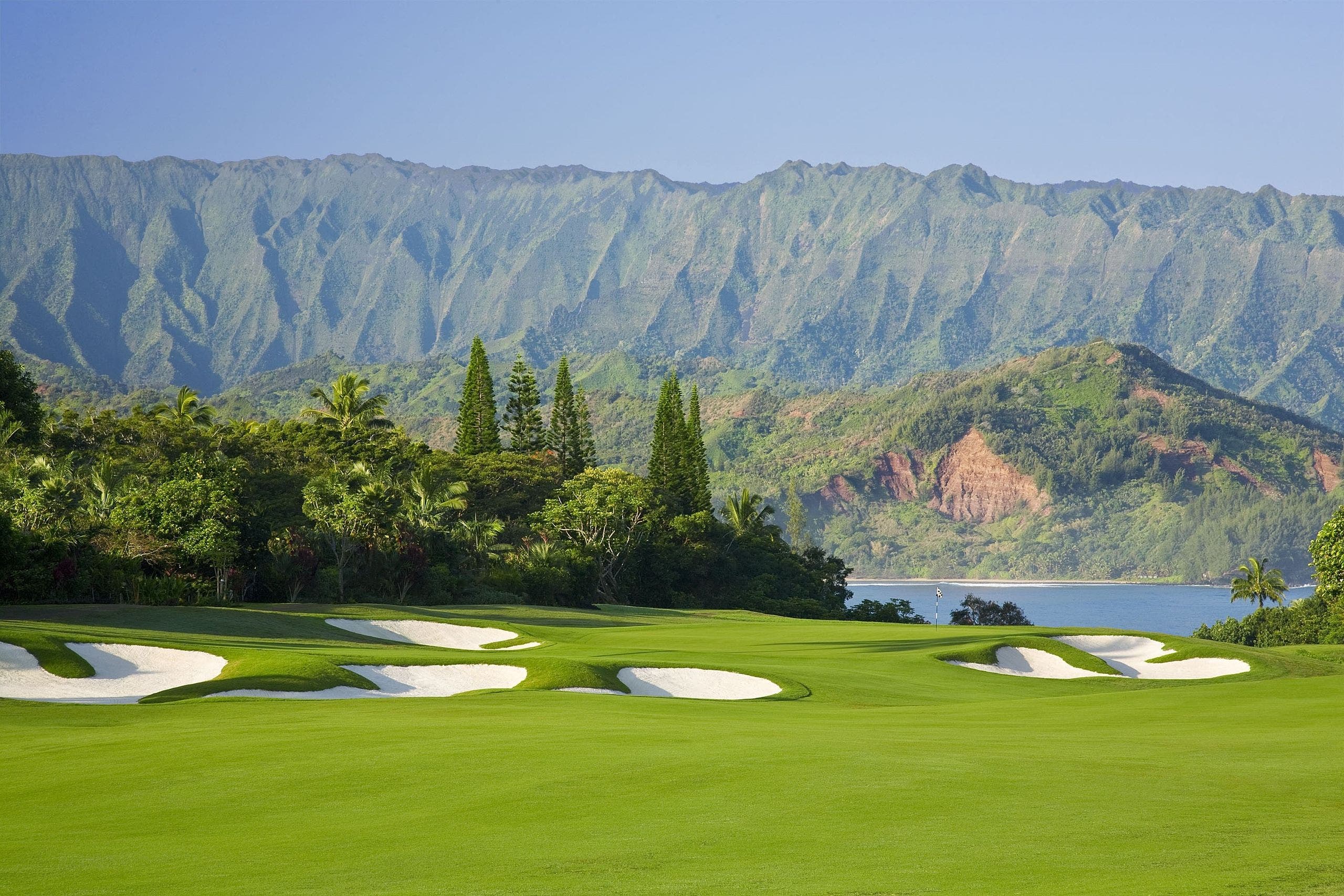 Landscape putting greens and fairway photo of the Princeville Makai Golf Club golf course