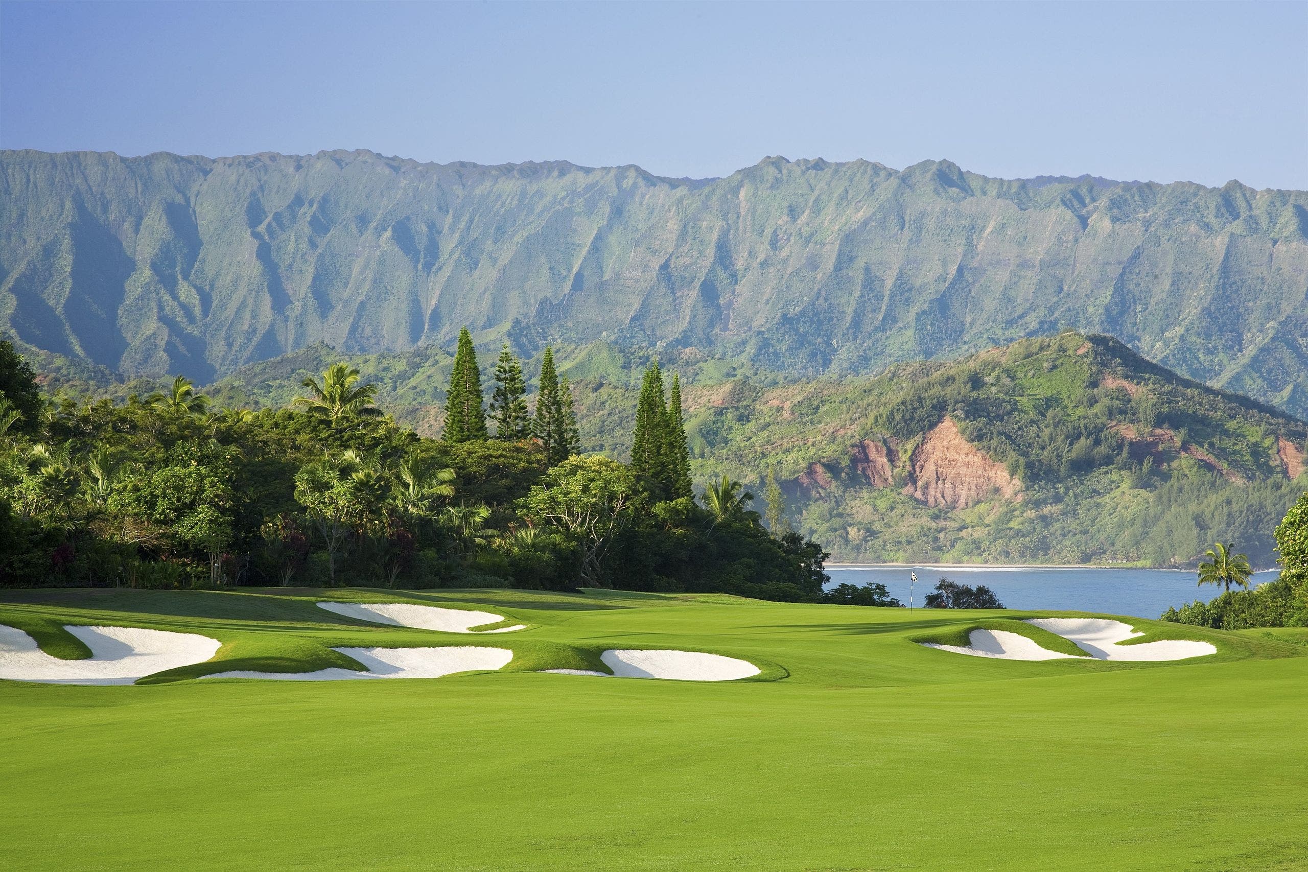 Landscape putting greens and fairway photo of the Princeville Makai Golf Club golf course