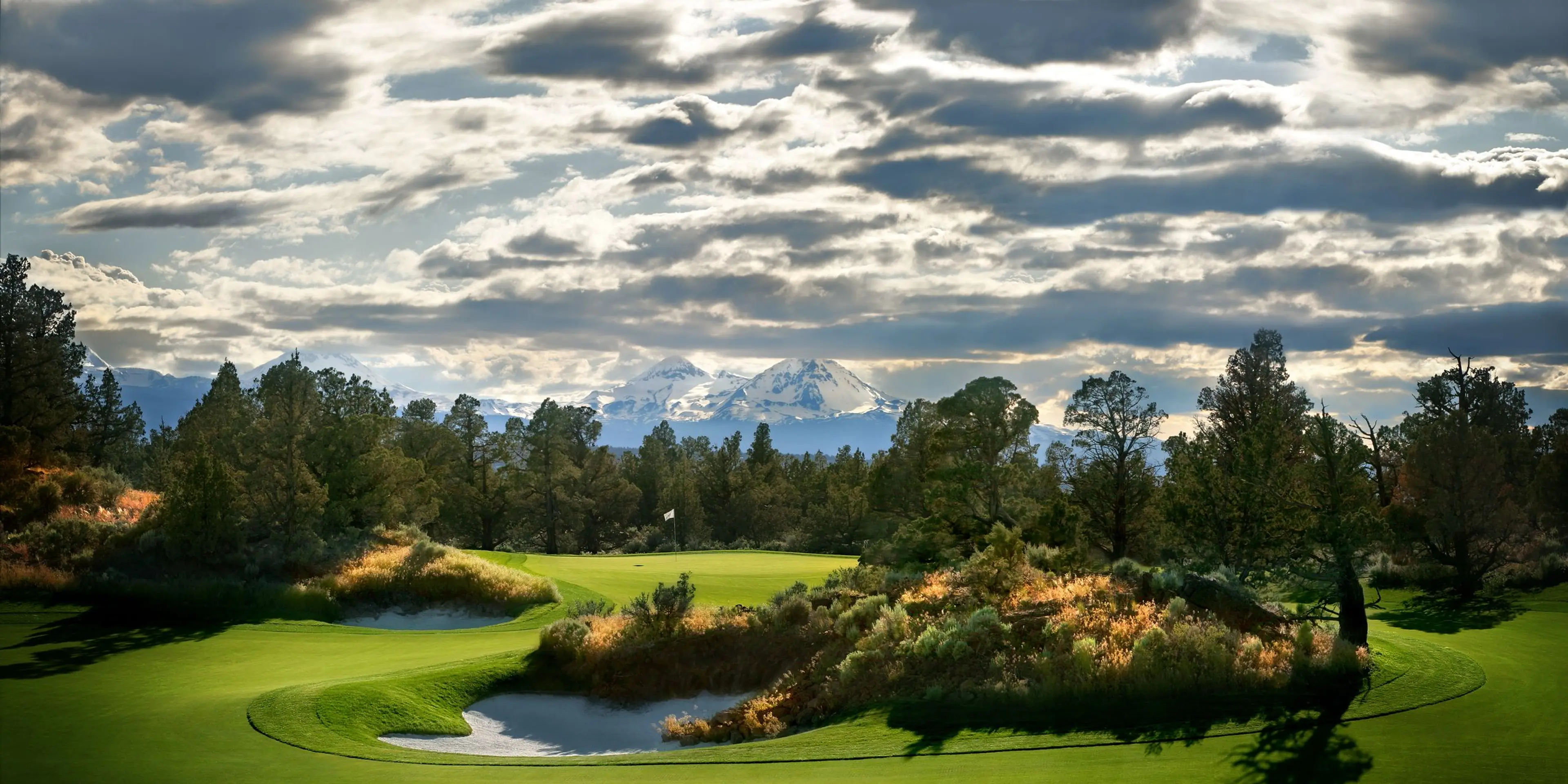 Landscape putting greens and fairway photo of the Pronghorn at Juniper Preserve golf course