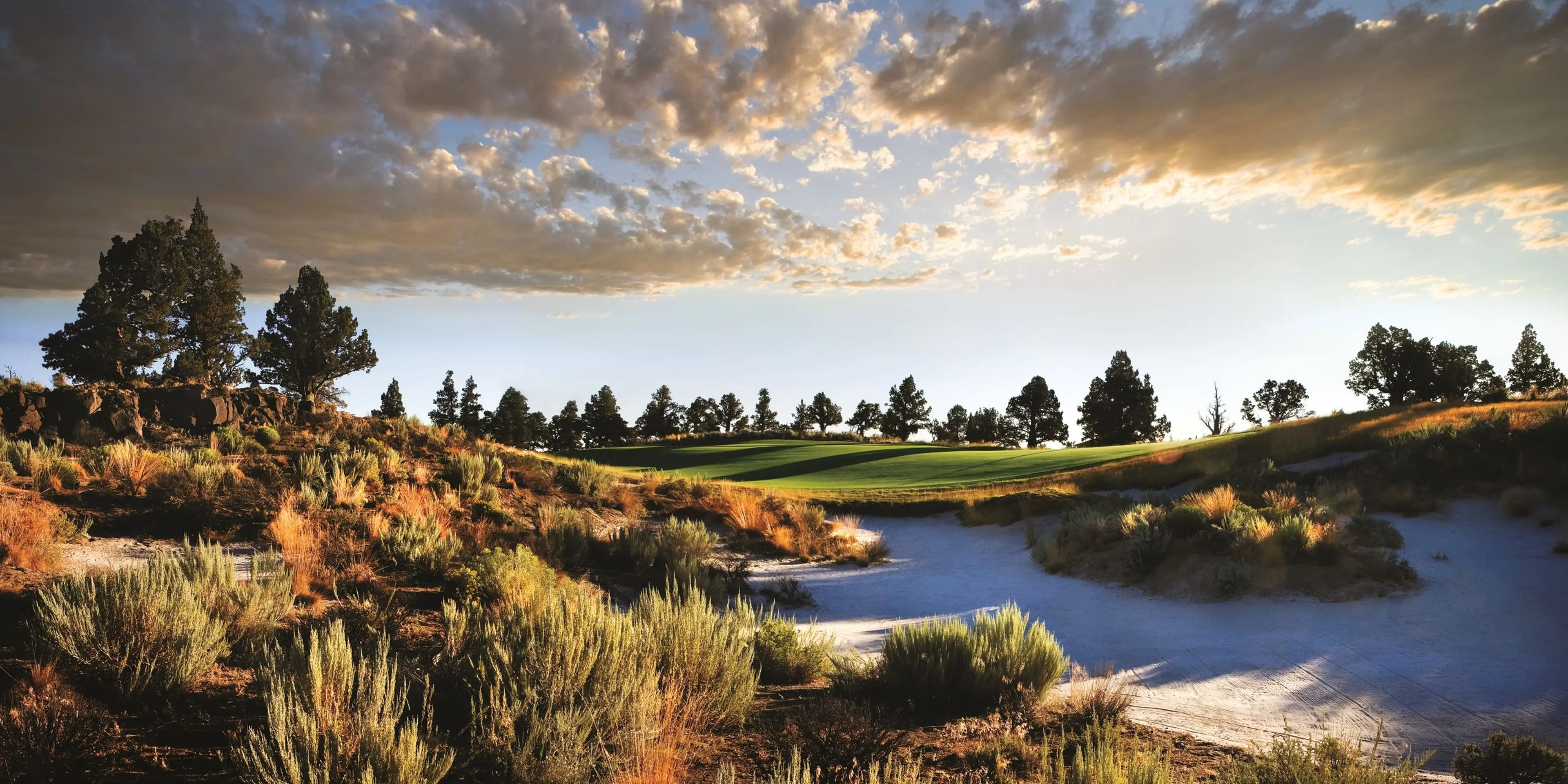 Landscape putting greens and fairway photo of the Pronghorn at Juniper Preserve golf course
