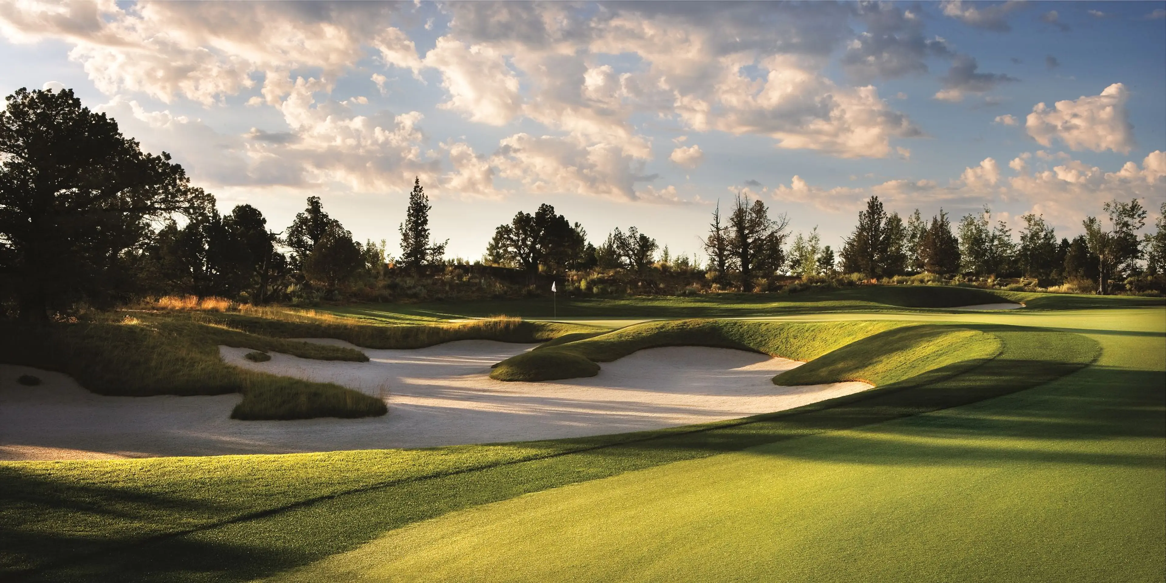 Landscape putting greens and fairway photo of the Pronghorn at Juniper Preserve golf course