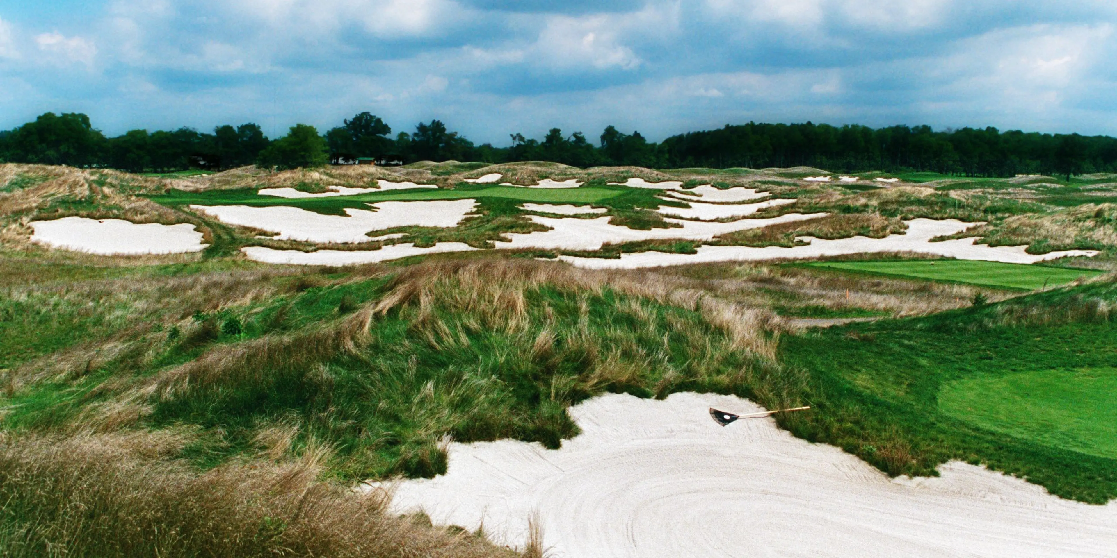 Landscape putting greens and fairway photo of the Purgatory Golf Club golf course